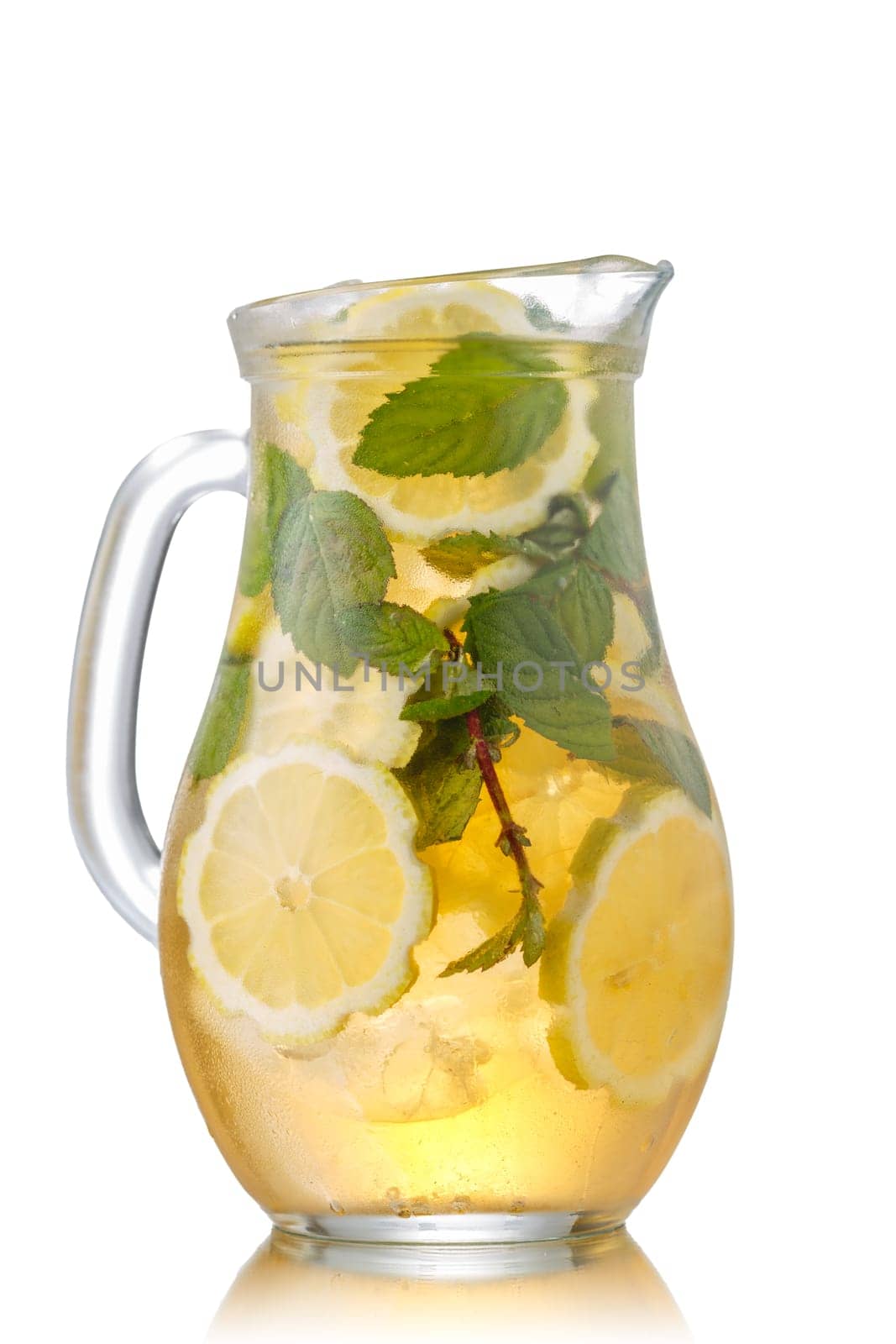Pitcher of sweet iced green tea with lemon and mint.