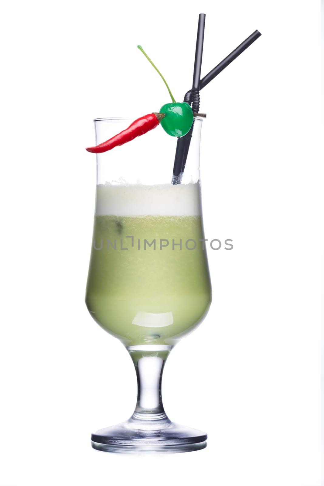 Alcohol cocktail decorated with cherries and tiny red pepper