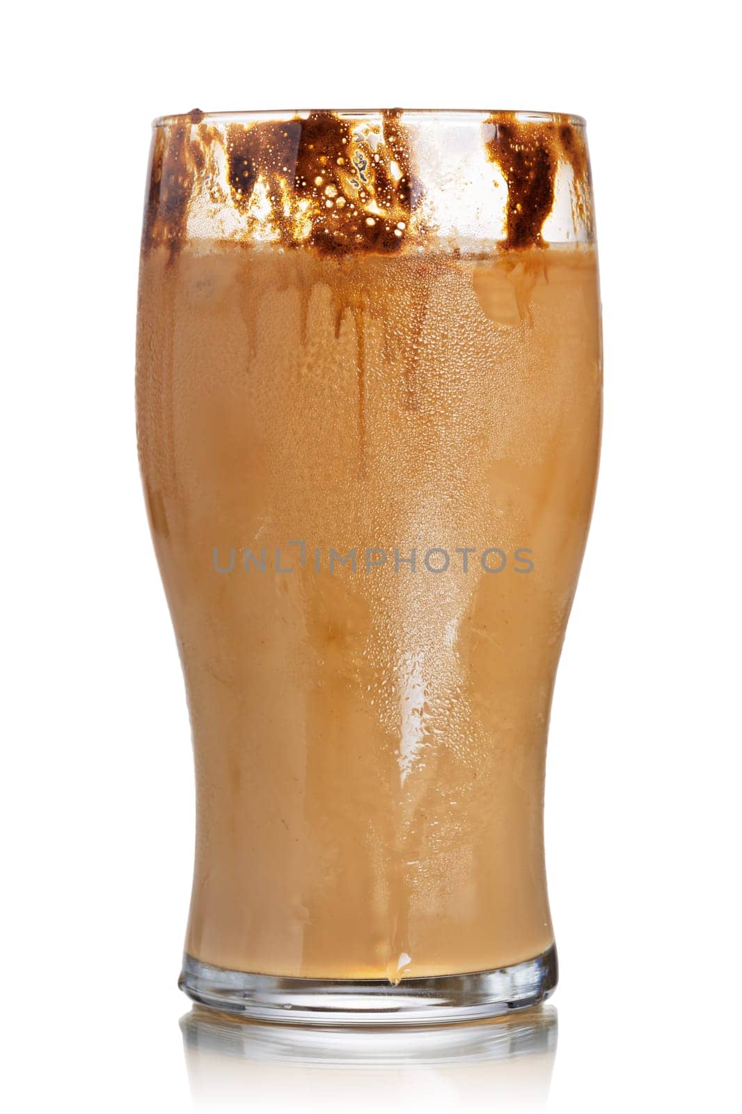 Milk coffee cocktail from frozen coffee cubes in highball glass. Iced milk coffee