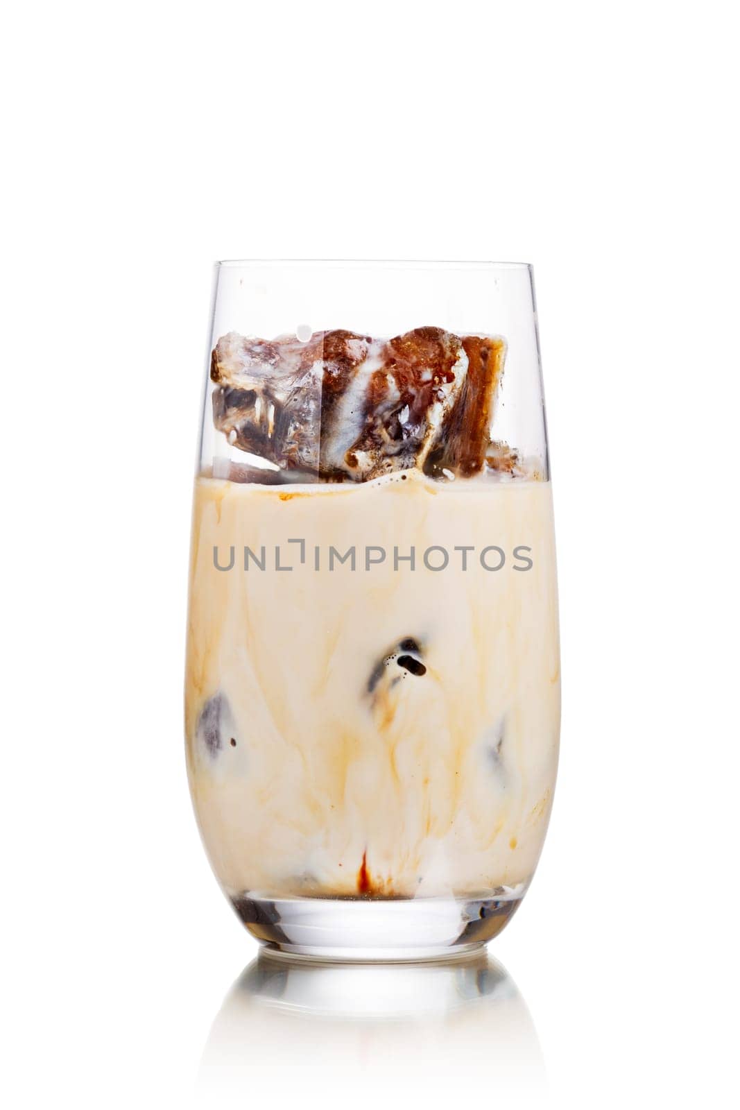 Milk coffee cocktail from frozen coffee cubes in highball glass. Iced milk coffee