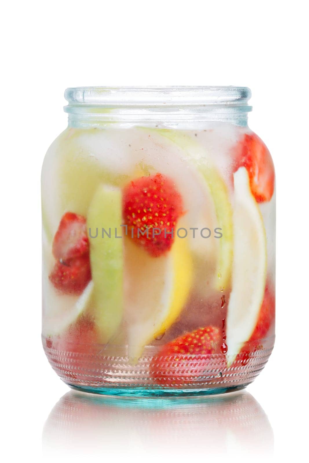 Glass jar of iced detox water with strawberry, apple and lemon