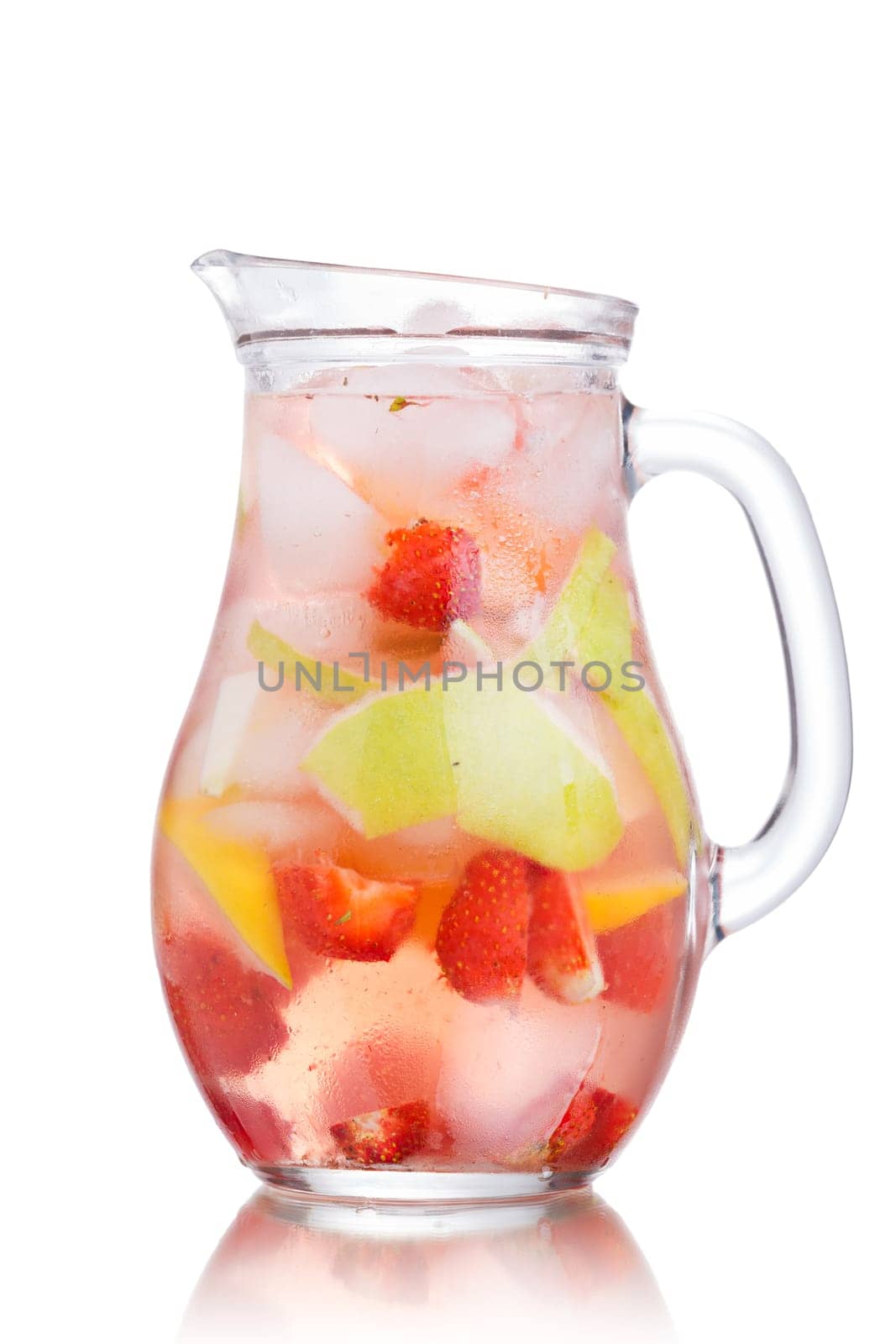 Glass jug of iced detox water with strawberry, apple and lemon