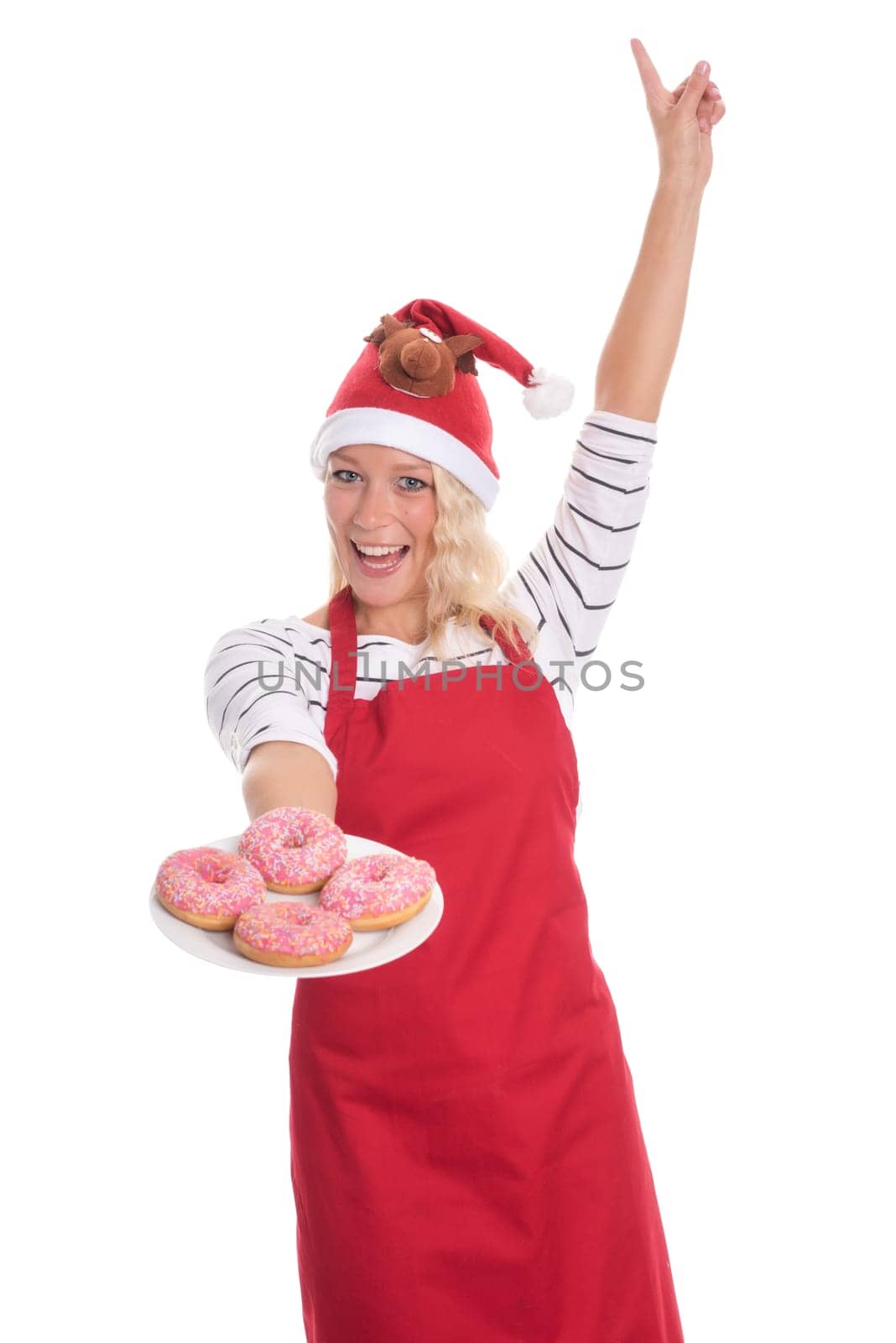 Christmas woman with a plate of doughnuts