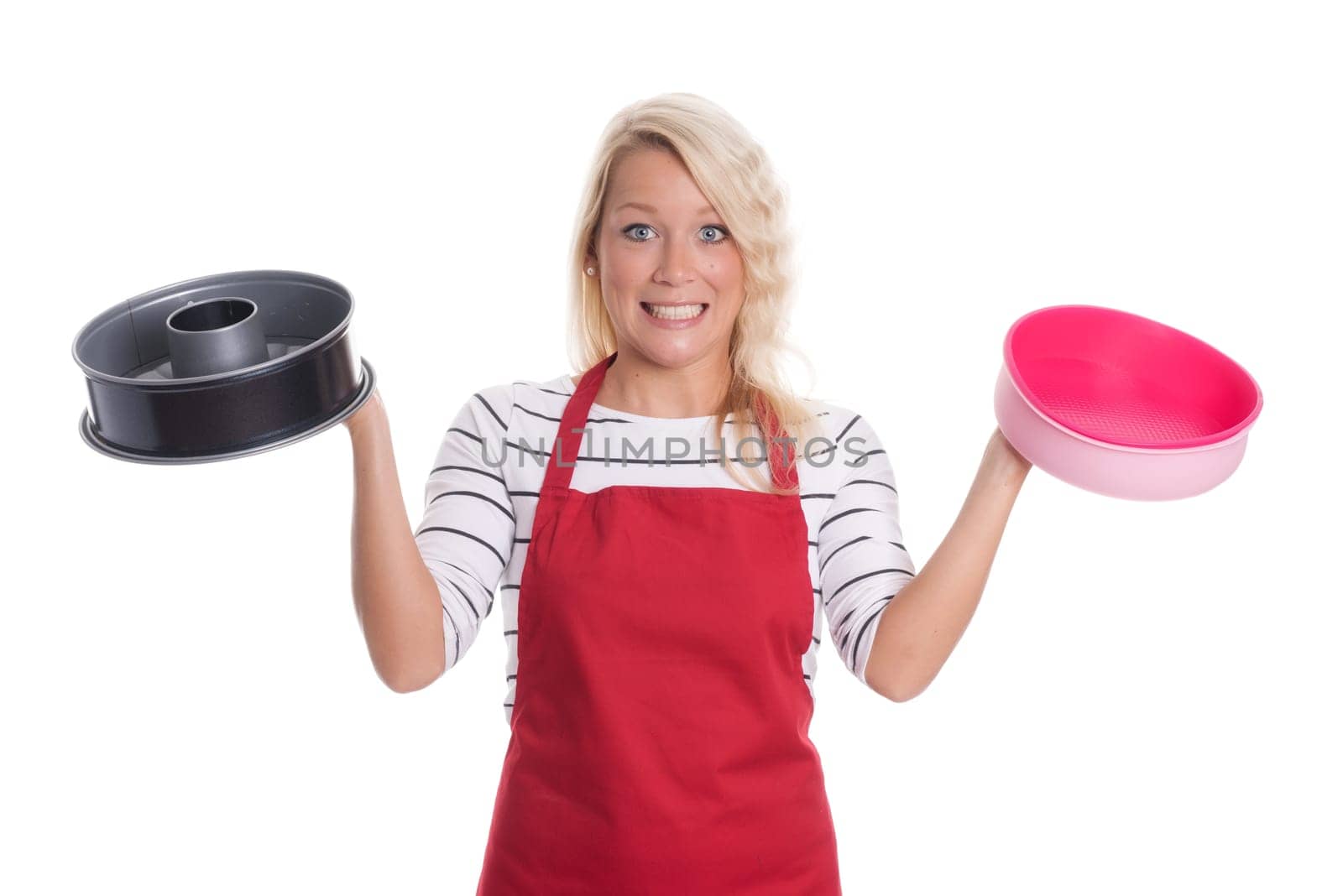Housewife keeps different baking tins and is skeptical