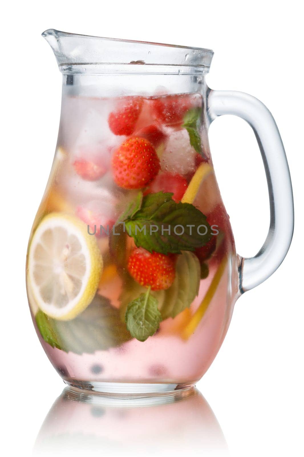 Glass pitcher of strawberry mojito