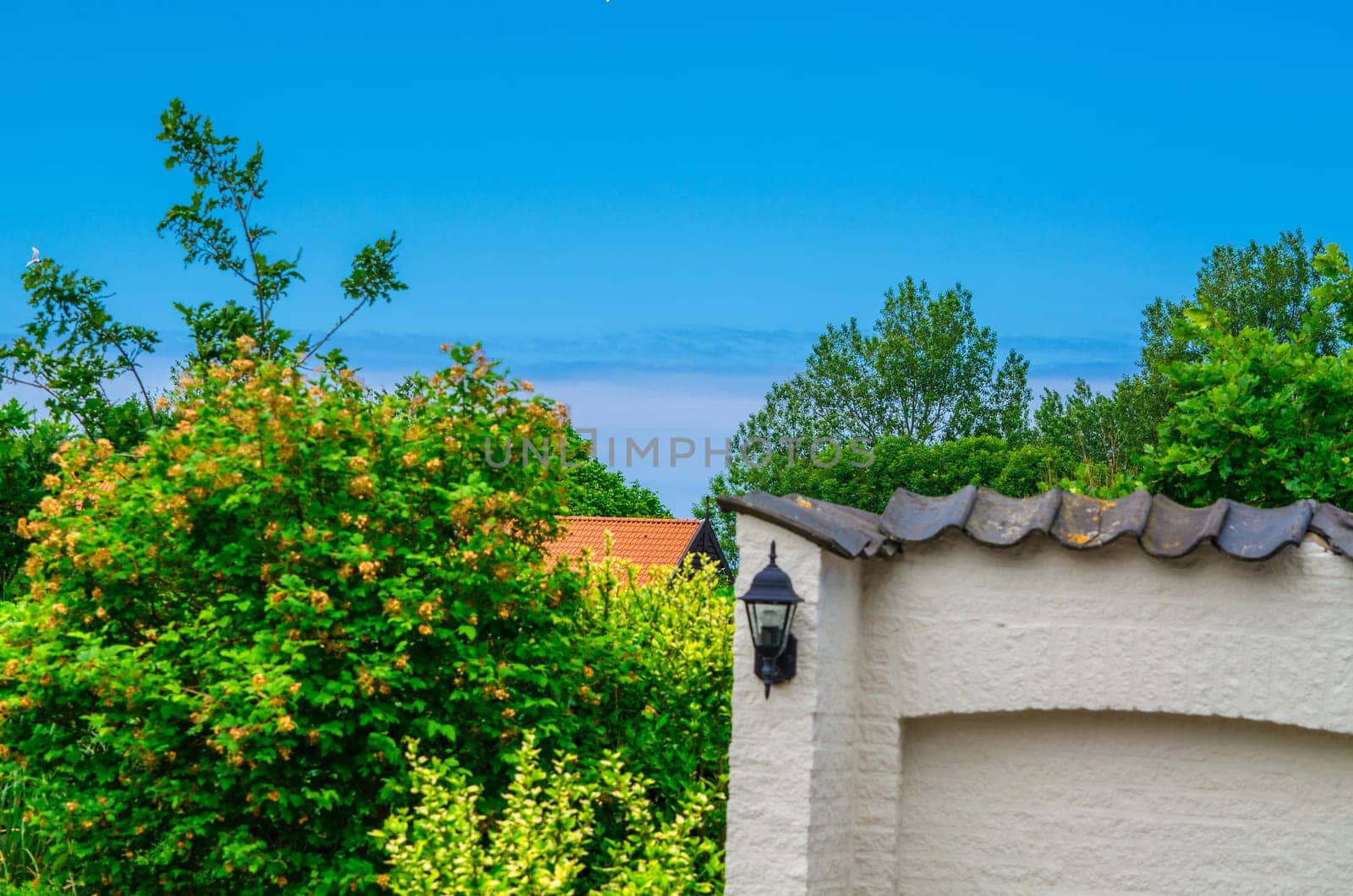 View from the terrace of a holiday villa to the horizon and the sea.