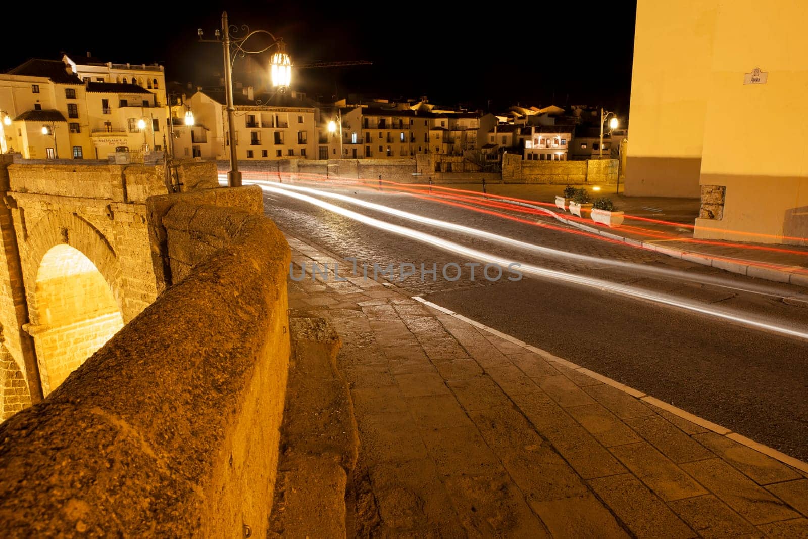 Illuminated bridge from old town of Ronda, Spain. Night scene