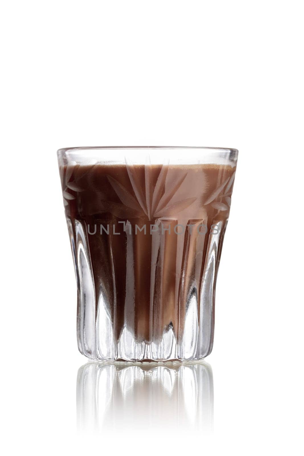 Cappuccinotini alcoholic cocktail in faceted shot glass (shooter)