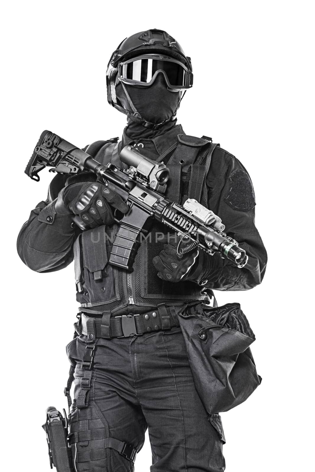 Spec ops police officer SWAT in black uniform and face mask studio shot