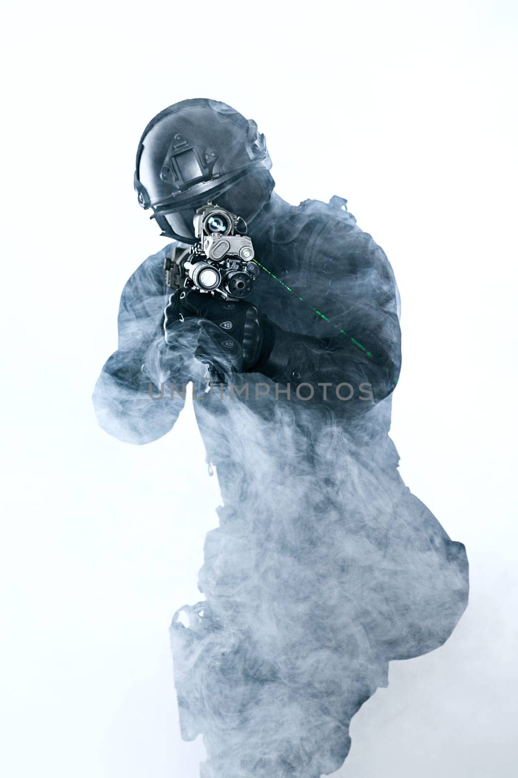 police officer SWAT in black uniform and face mask studio shot