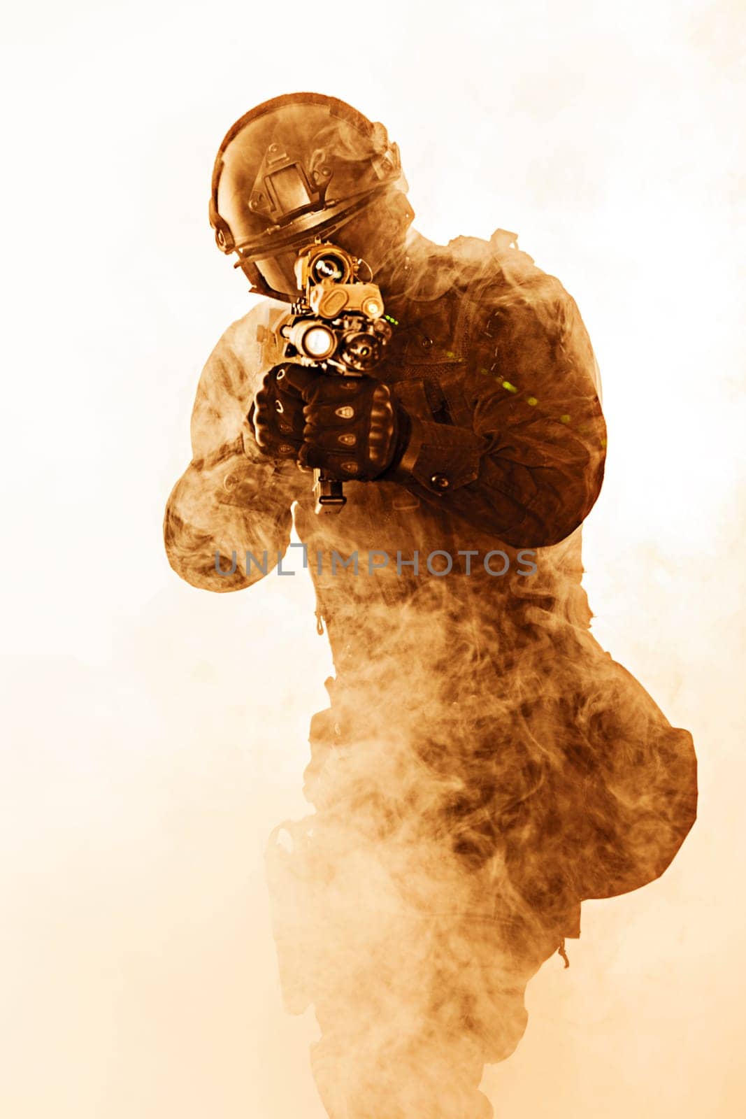 police officer SWAT in black uniform and face mask studio shot