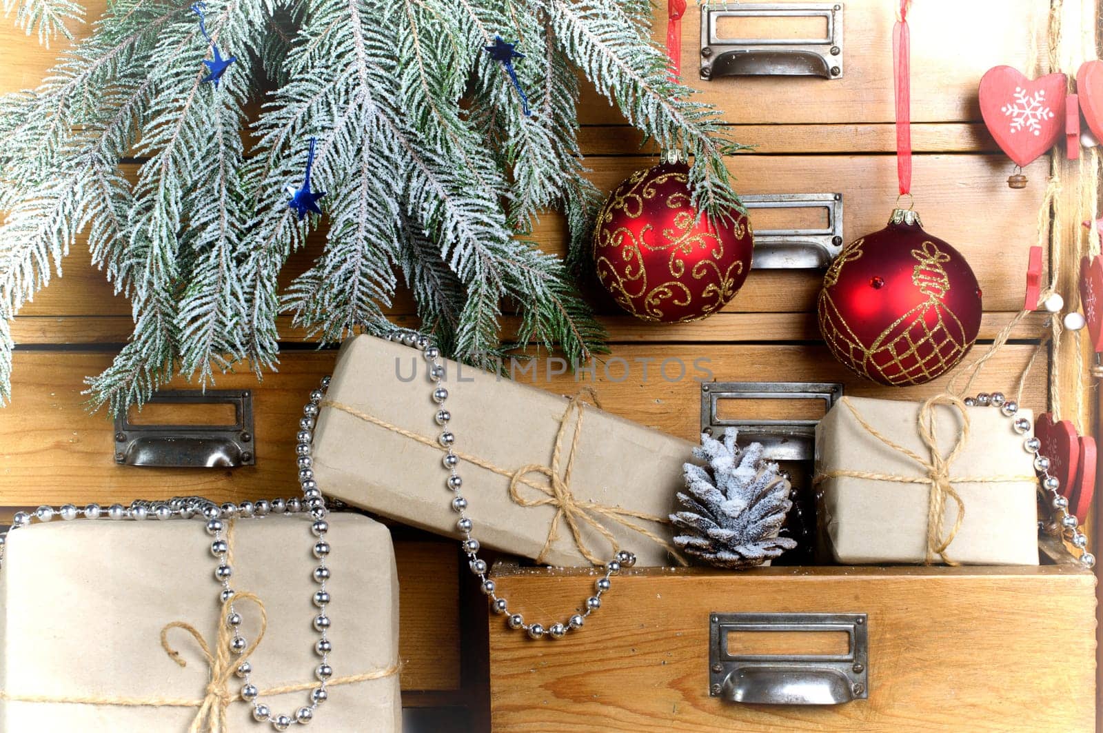 Christmas gifts in the drawer of a cabinet