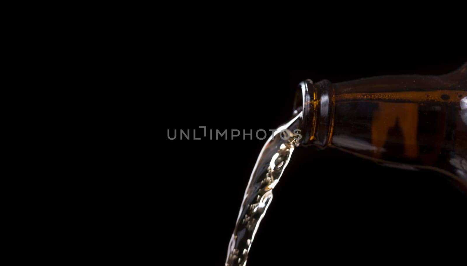 Beer Pouring From Bottle