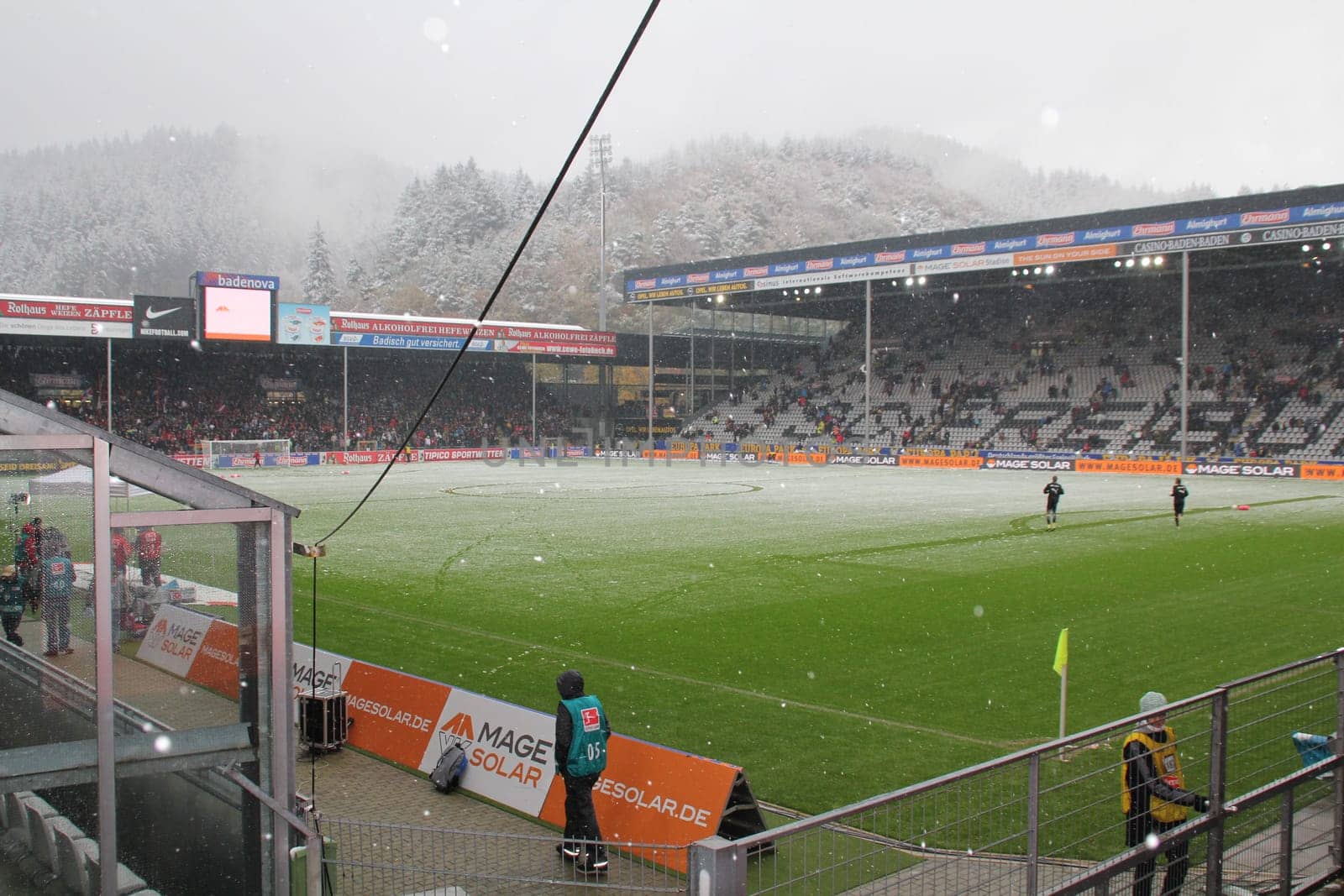 Freiburg's Mage Solar Stadium with snow-covered lawn