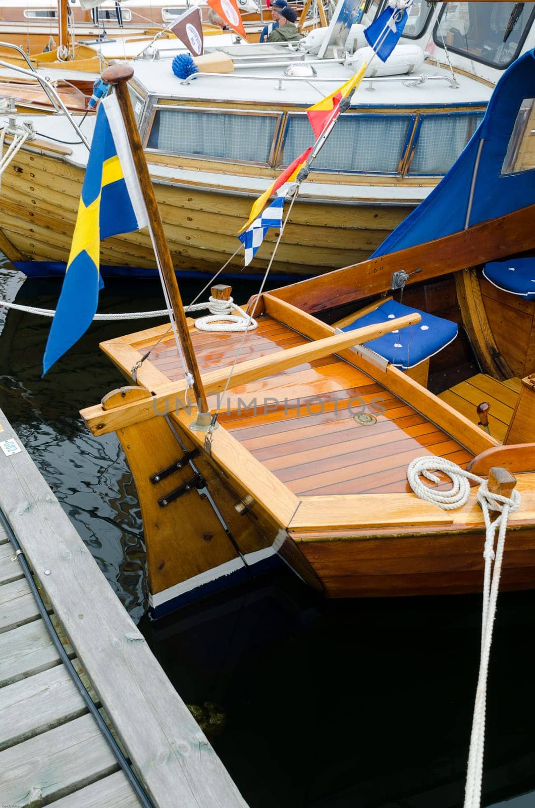 back of a sailboat of wood beutiful and well groomed