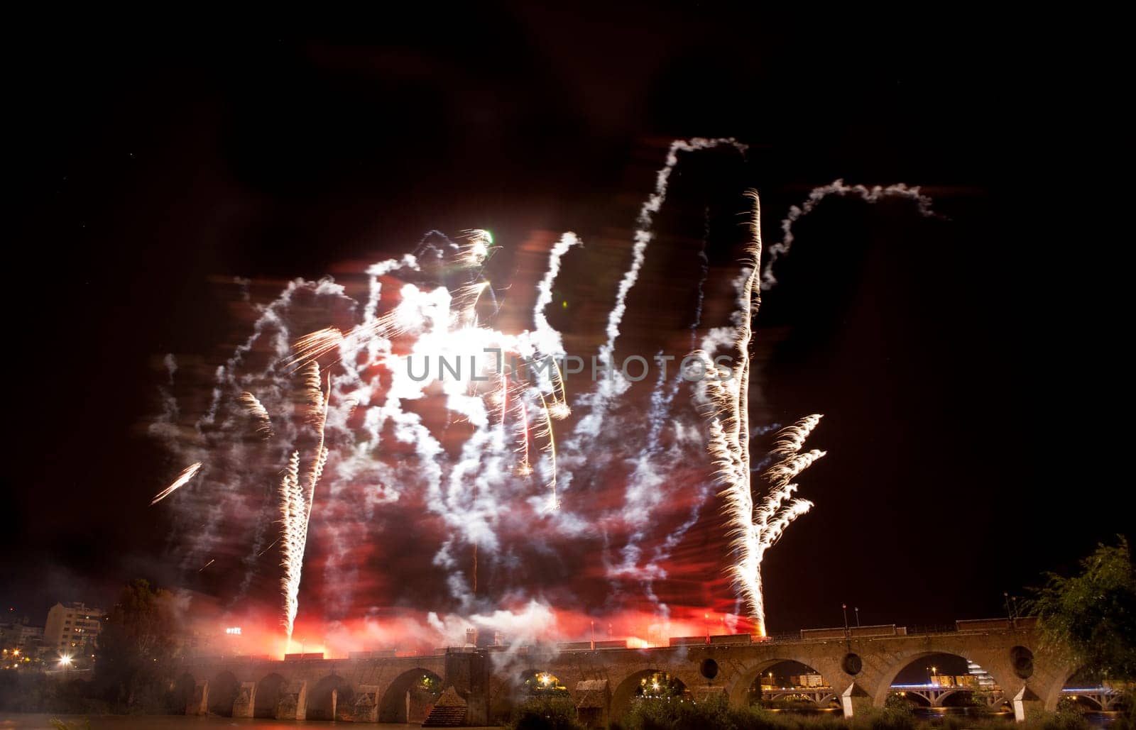 People observing the Puente de Palmas fireworks at San Juan festivity night