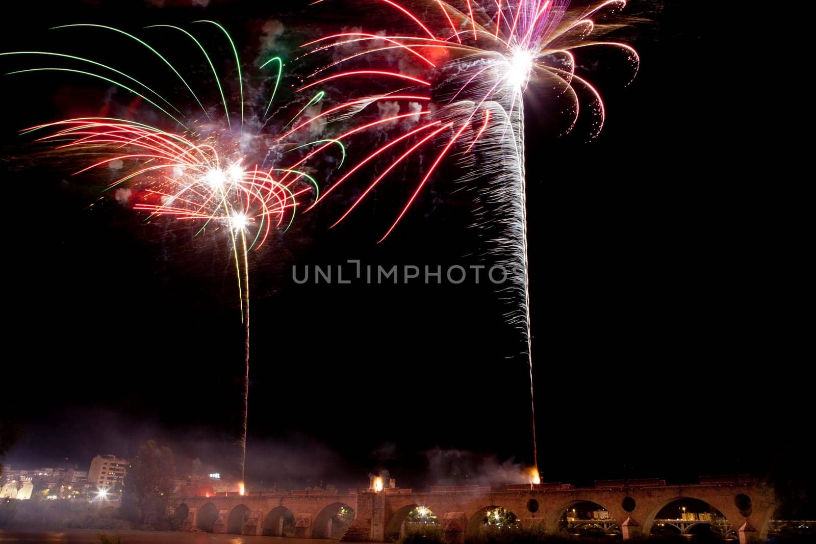 People observing the Puente de Palmas fireworks at San Juan festivity night