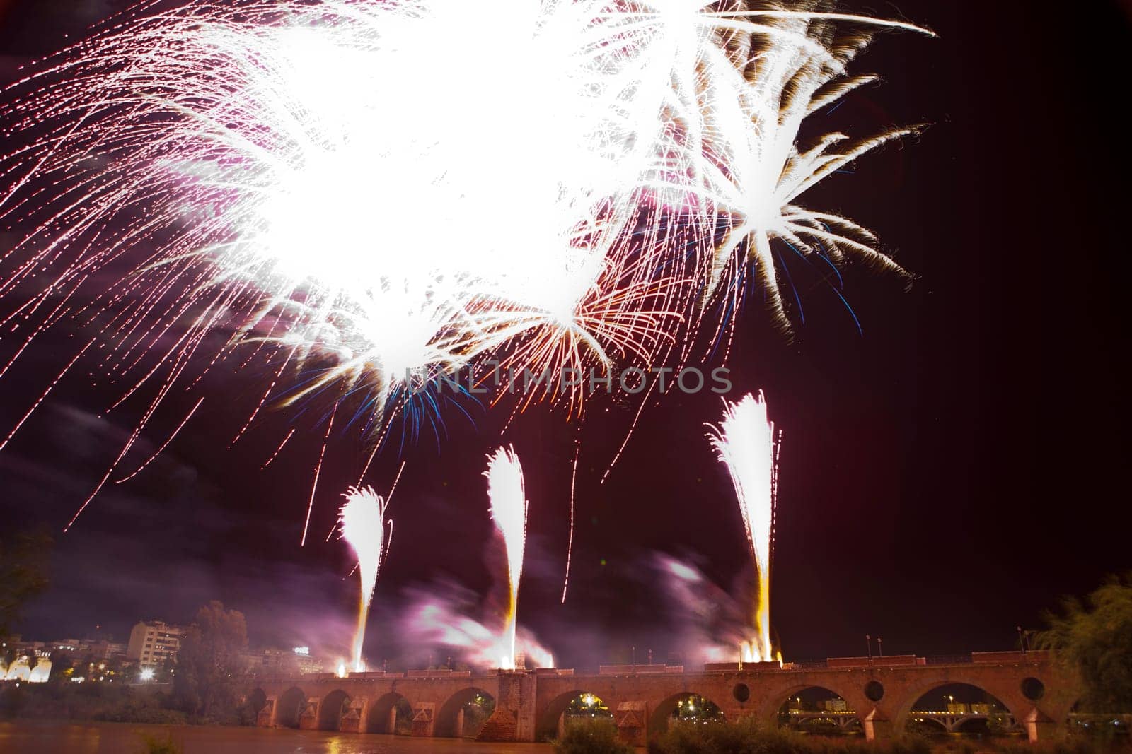 People observing the Puente de Palmas fireworks at San Juan festivity night