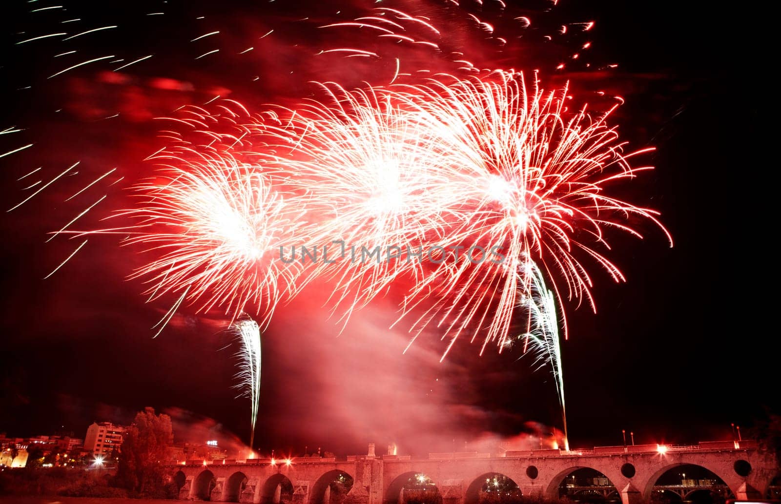 People observing the Puente de Palmas fireworks at San Juan festivity night