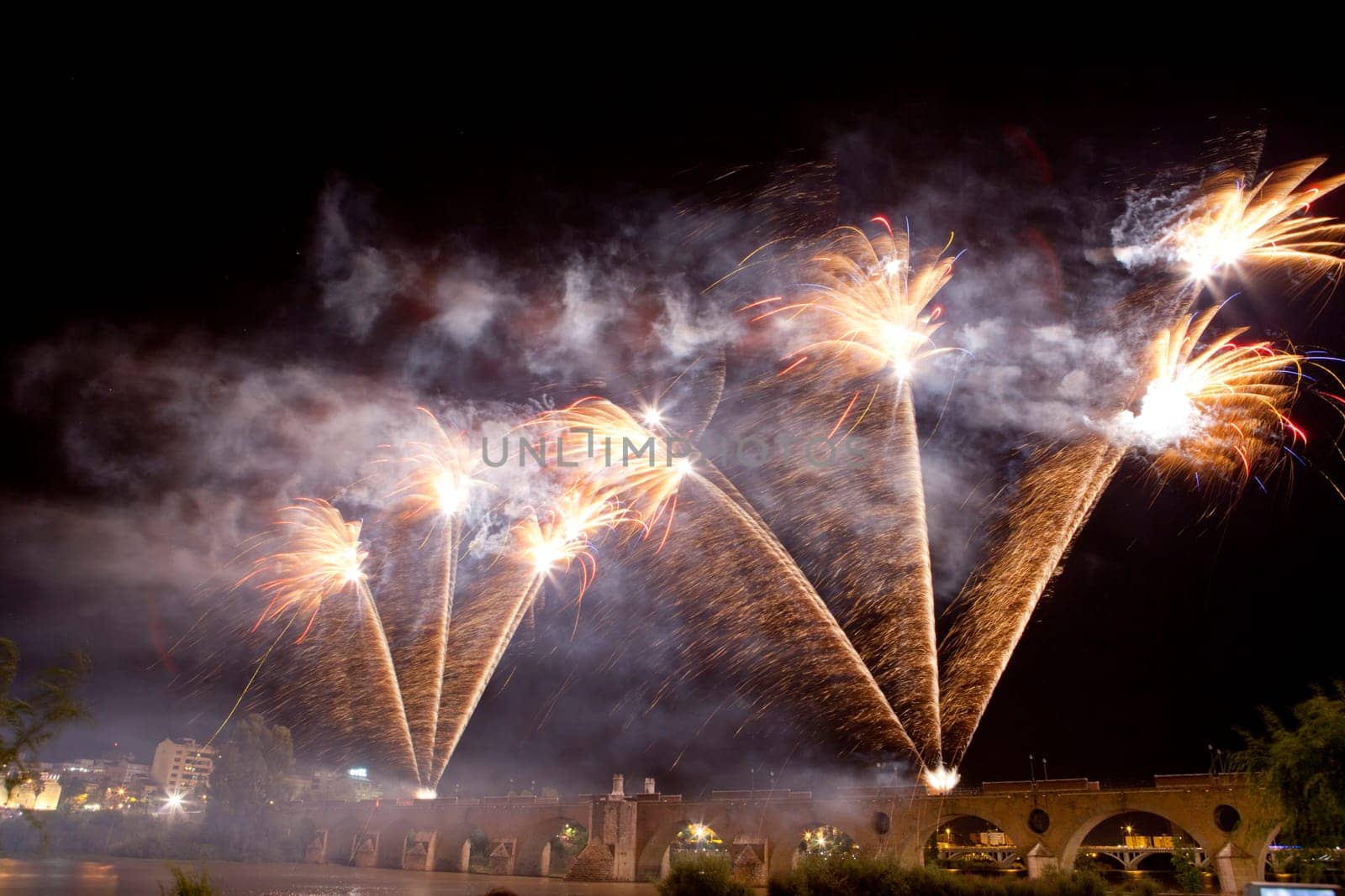 People observing the Puente de Palmas fireworks at San Juan festivity night