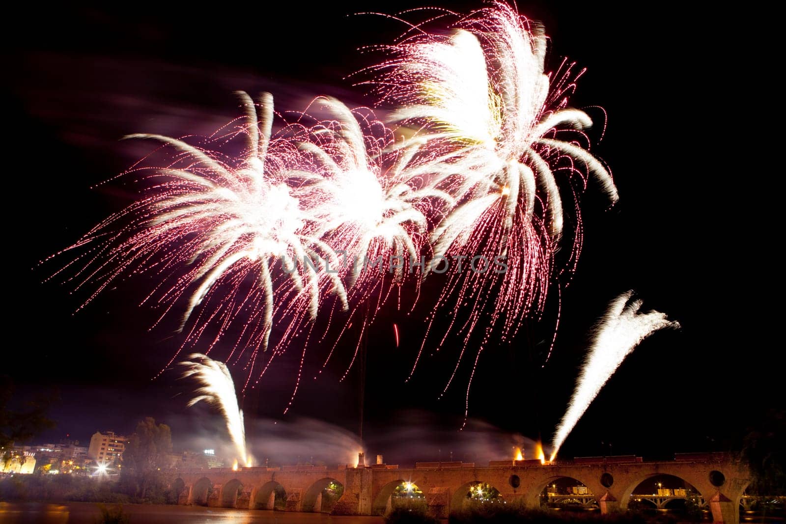 People observing the Puente de Palmas fireworks at San Juan festivity night