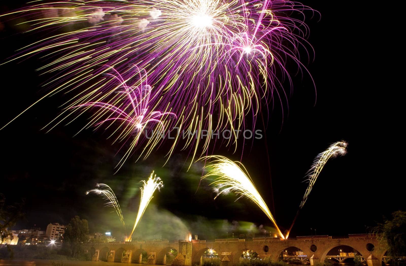 People observing the Puente de Palmas fireworks at San Juan festivity night
