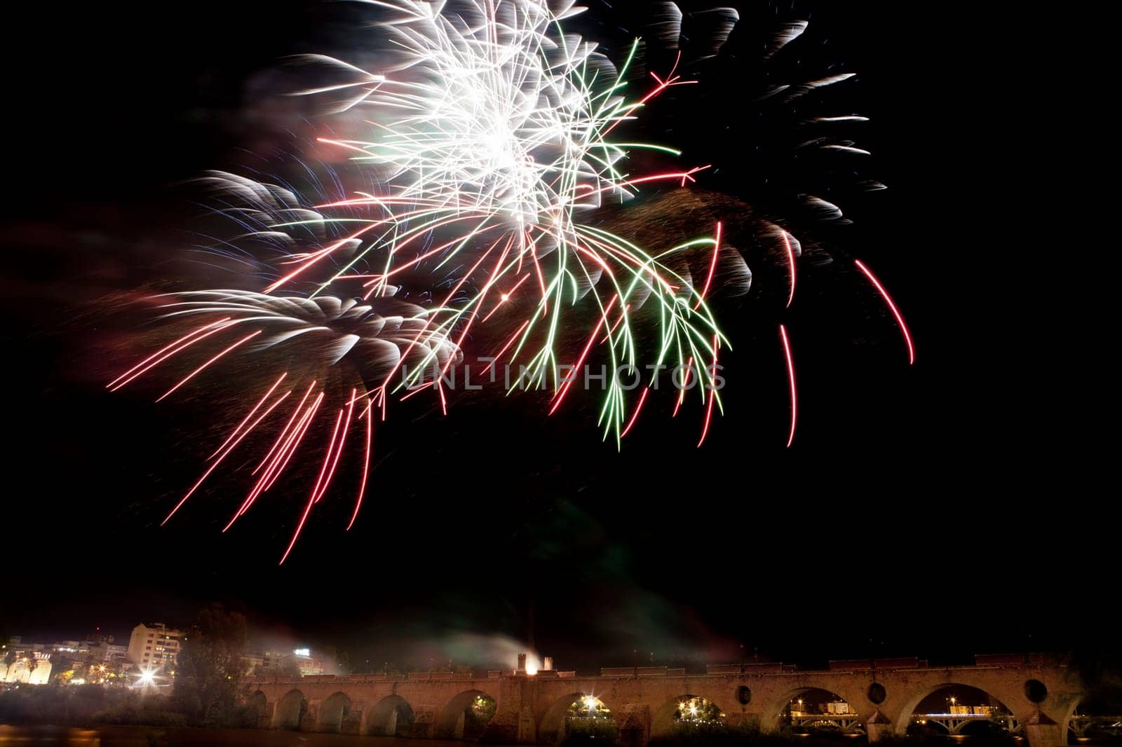 People observing the Puente de Palmas fireworks at San Juan festivity night