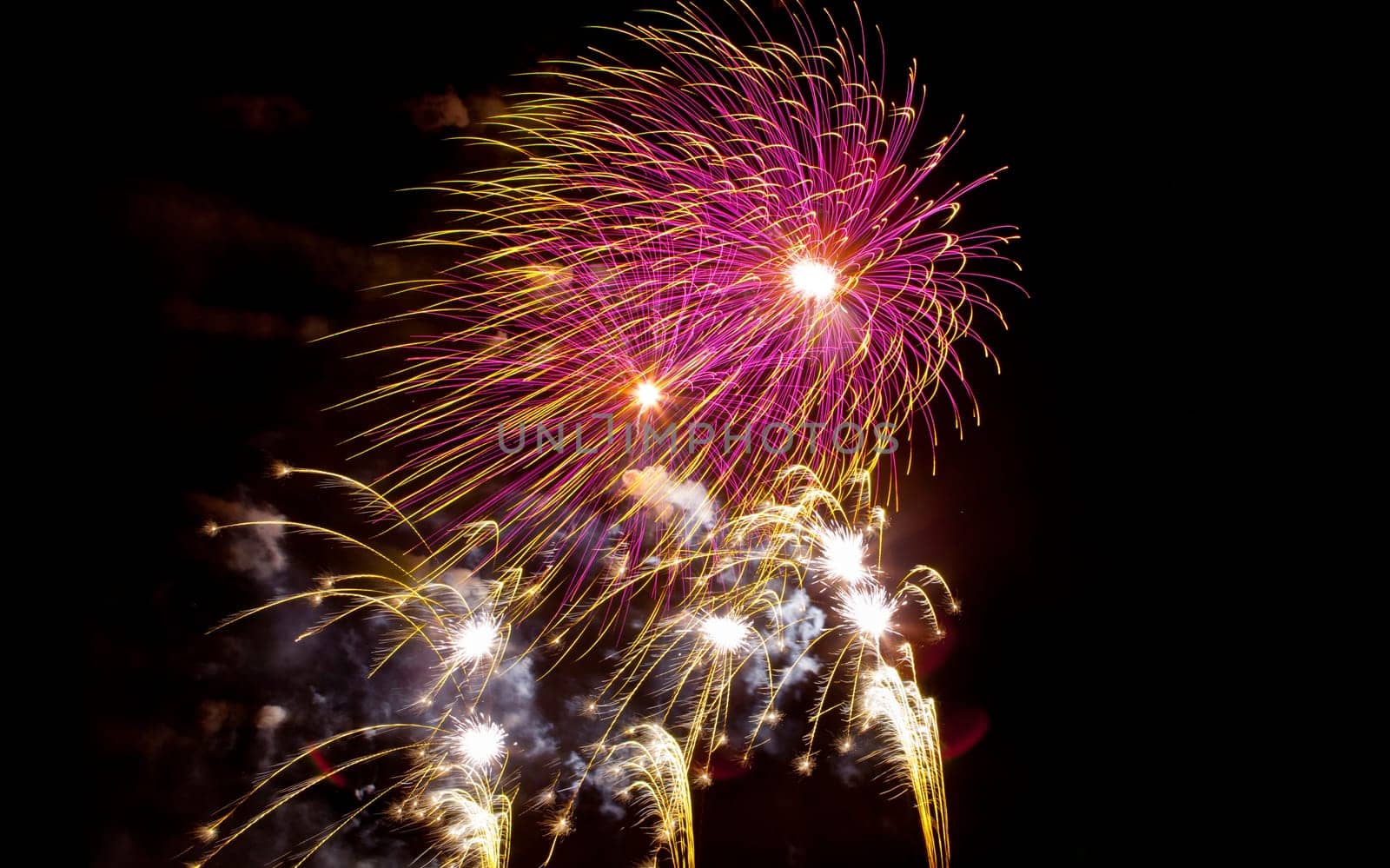 People observing the Puente de Palmas fireworks at San Juan festivity night