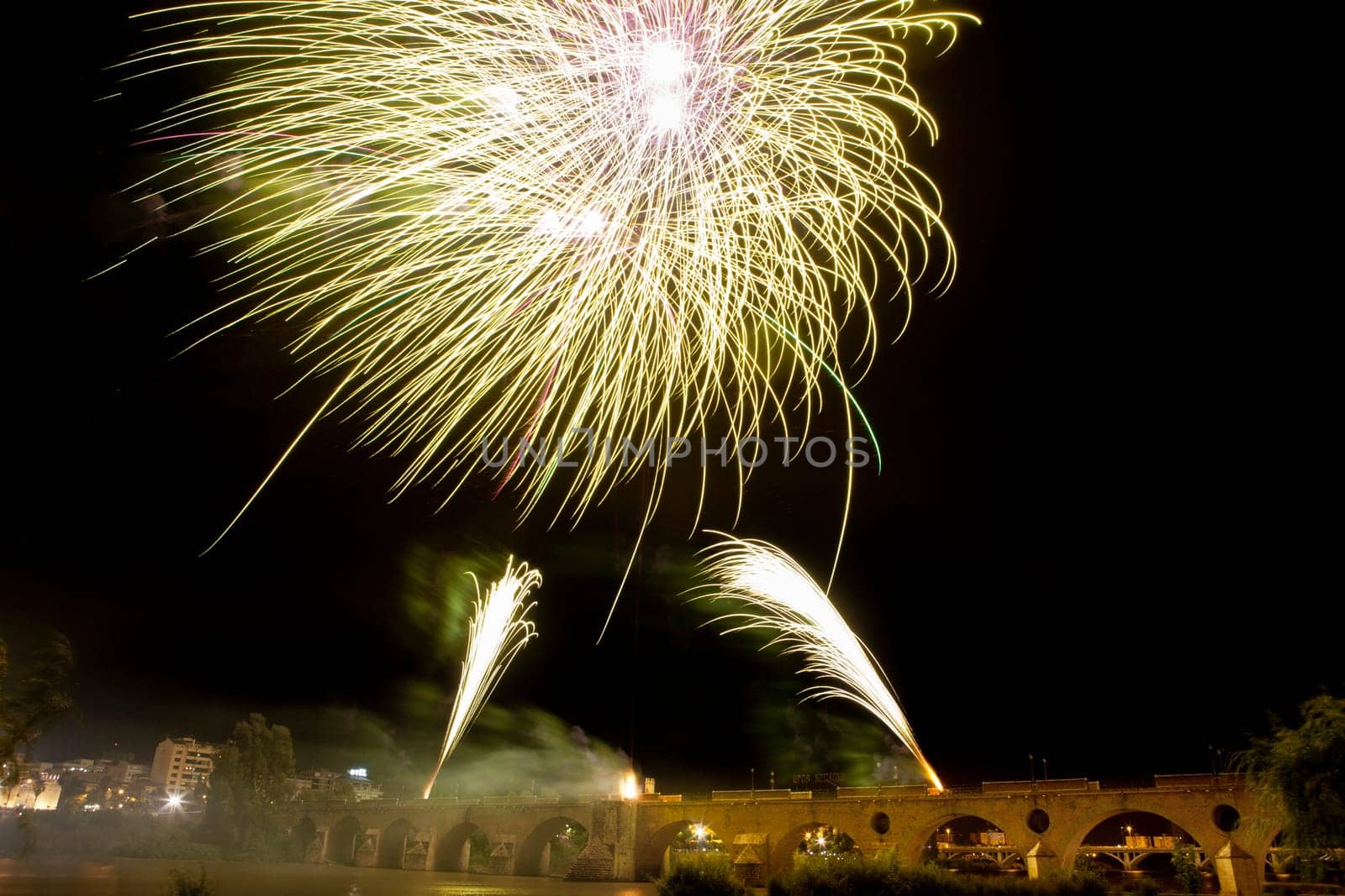 People observing the Puente de Palmas fireworks at San Juan festivity night
