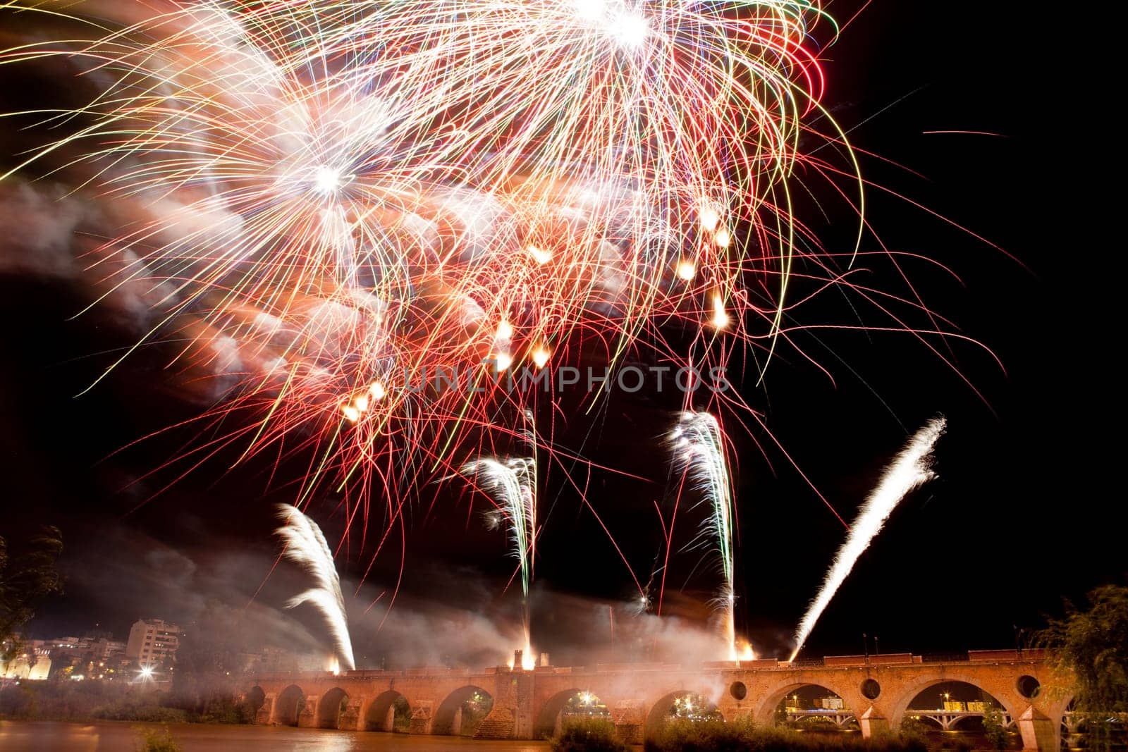 People observing the Puente de Palmas fireworks at San Juan festivity night
