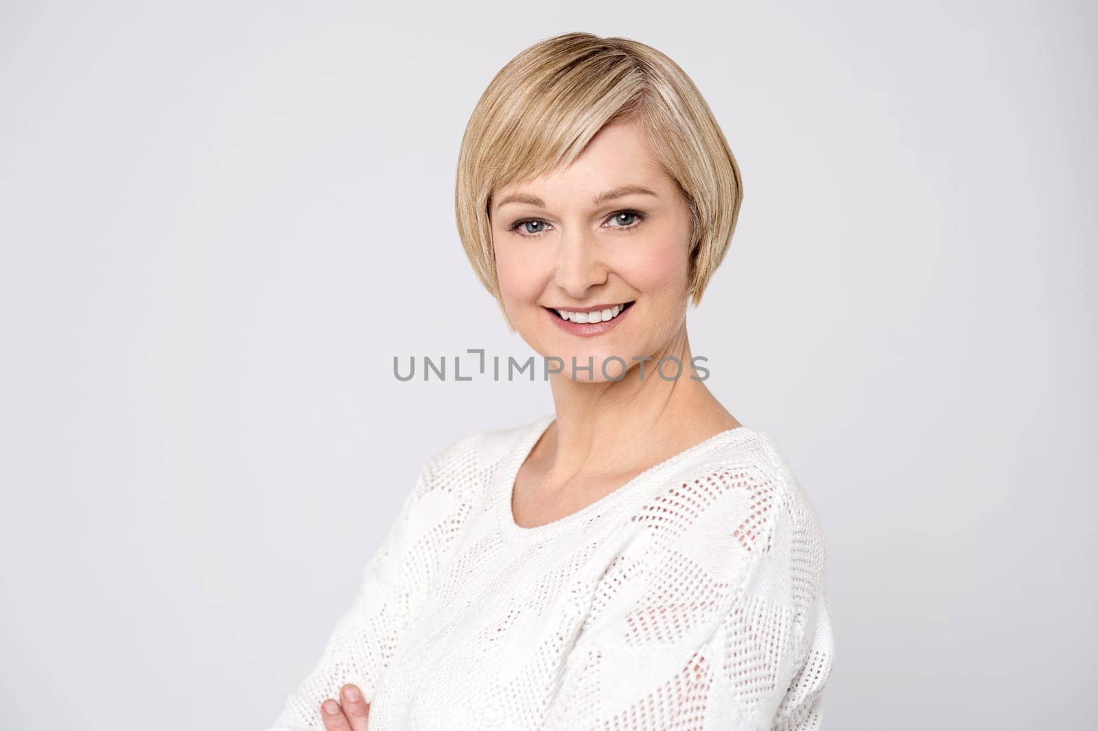 Beautiful woman smiling, grey background