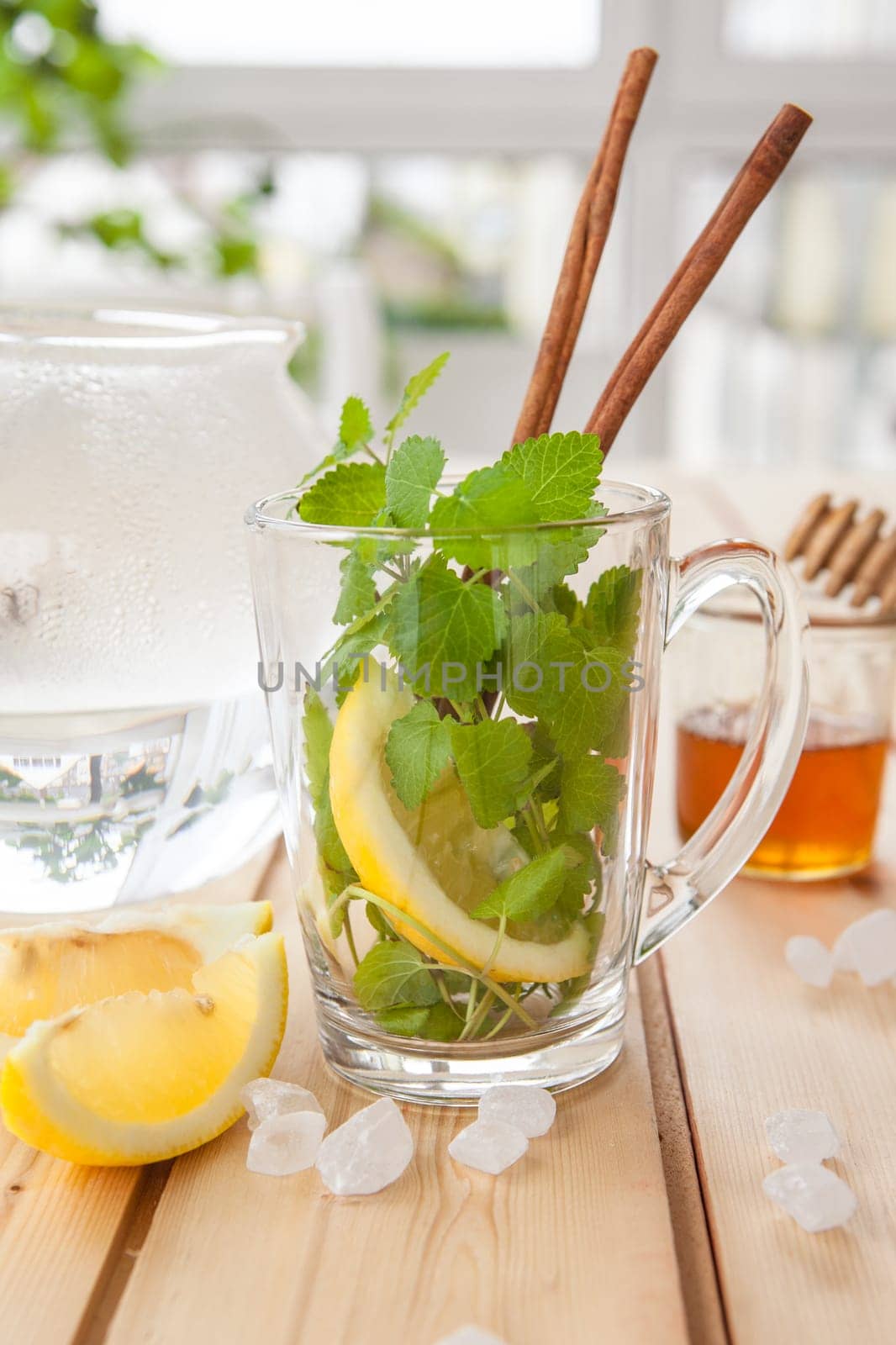 Cup of fresh tea with mint and lemon