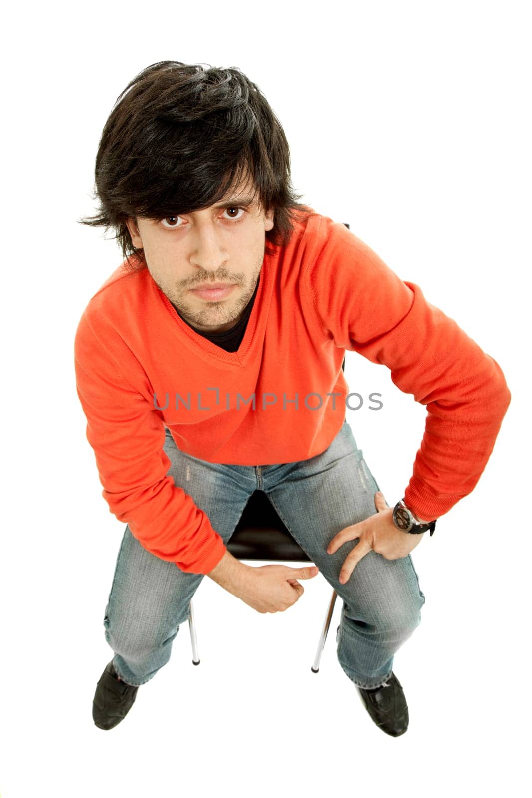 young casual man on a chair, isolated on white