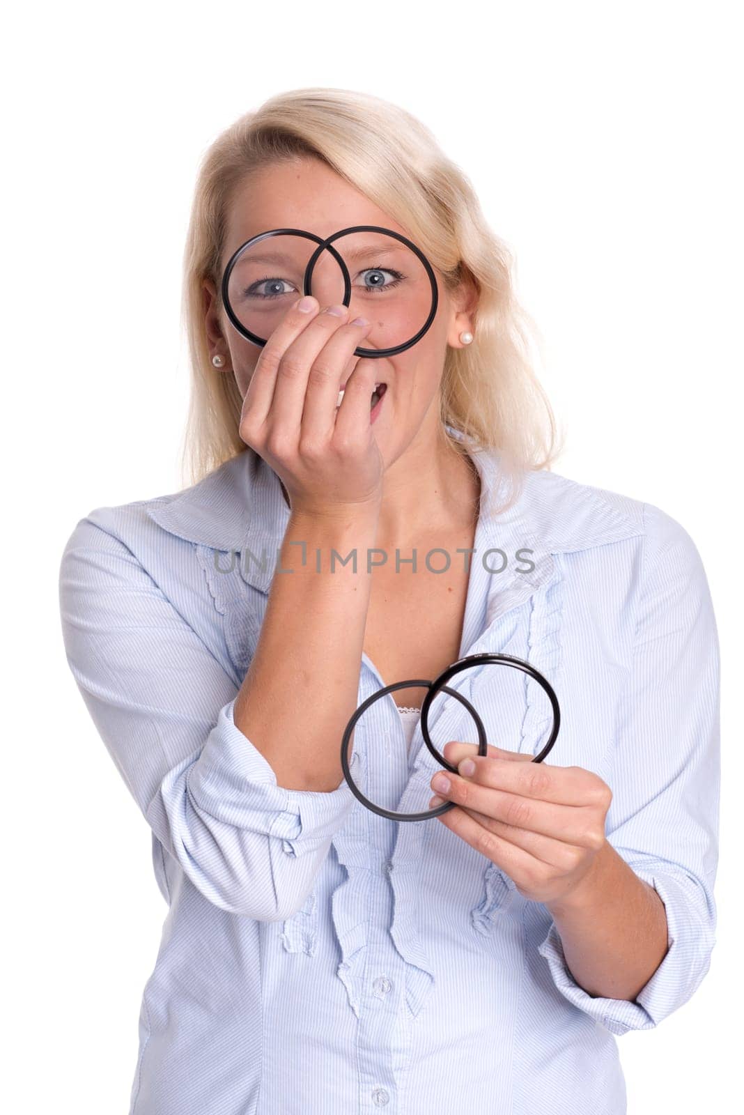 Young woman looks through photo filters