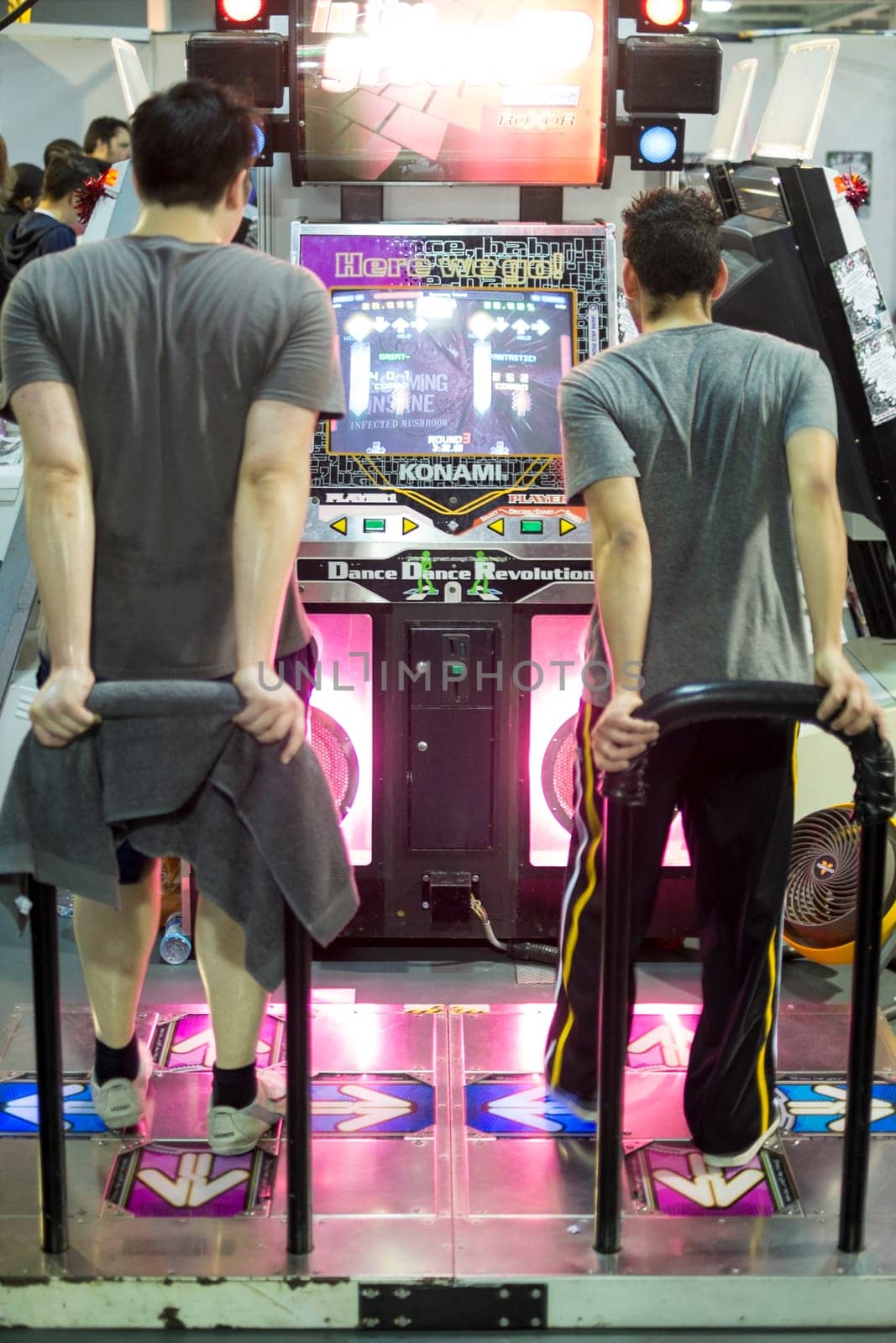 LONDON UK - NOVEMBER 15: Participants playing dancing video game in Hyper Japan. November 15, 2014 in London. Held in Kensington Olympia this year, the event celebrates all things Japanese.