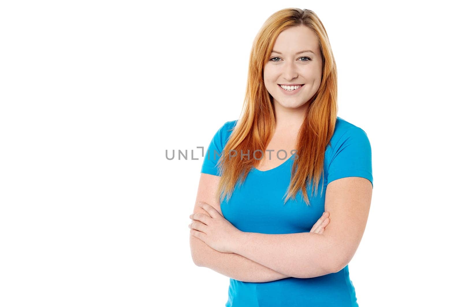 Young lady posing with arms crossed