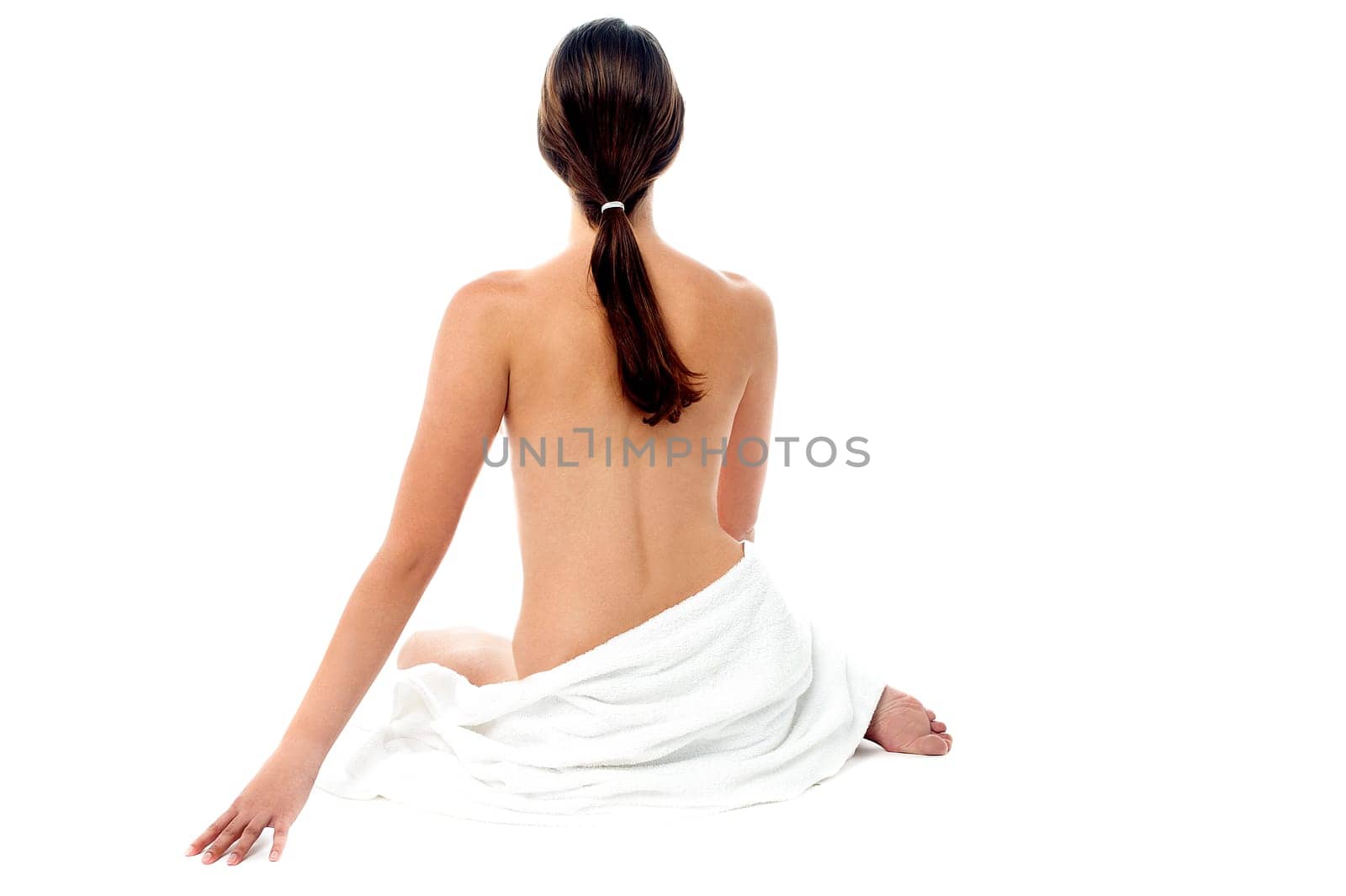 Portrait of a young topless woman