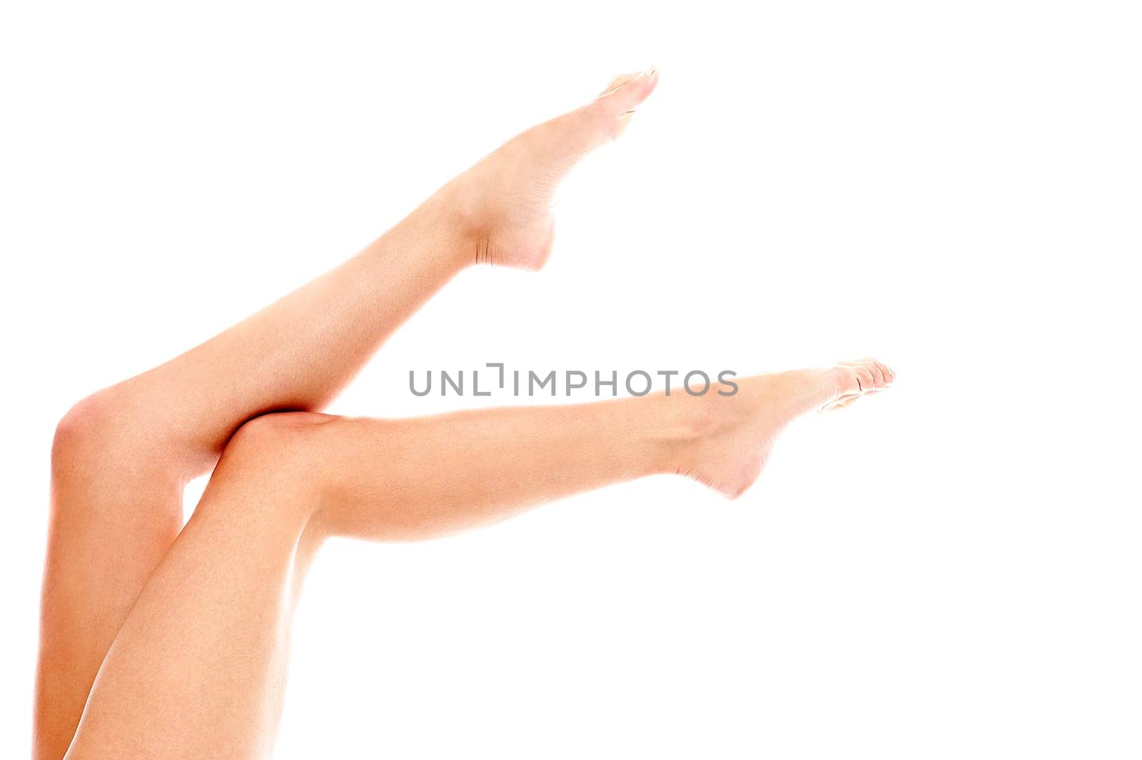 Feminie legs shot over white