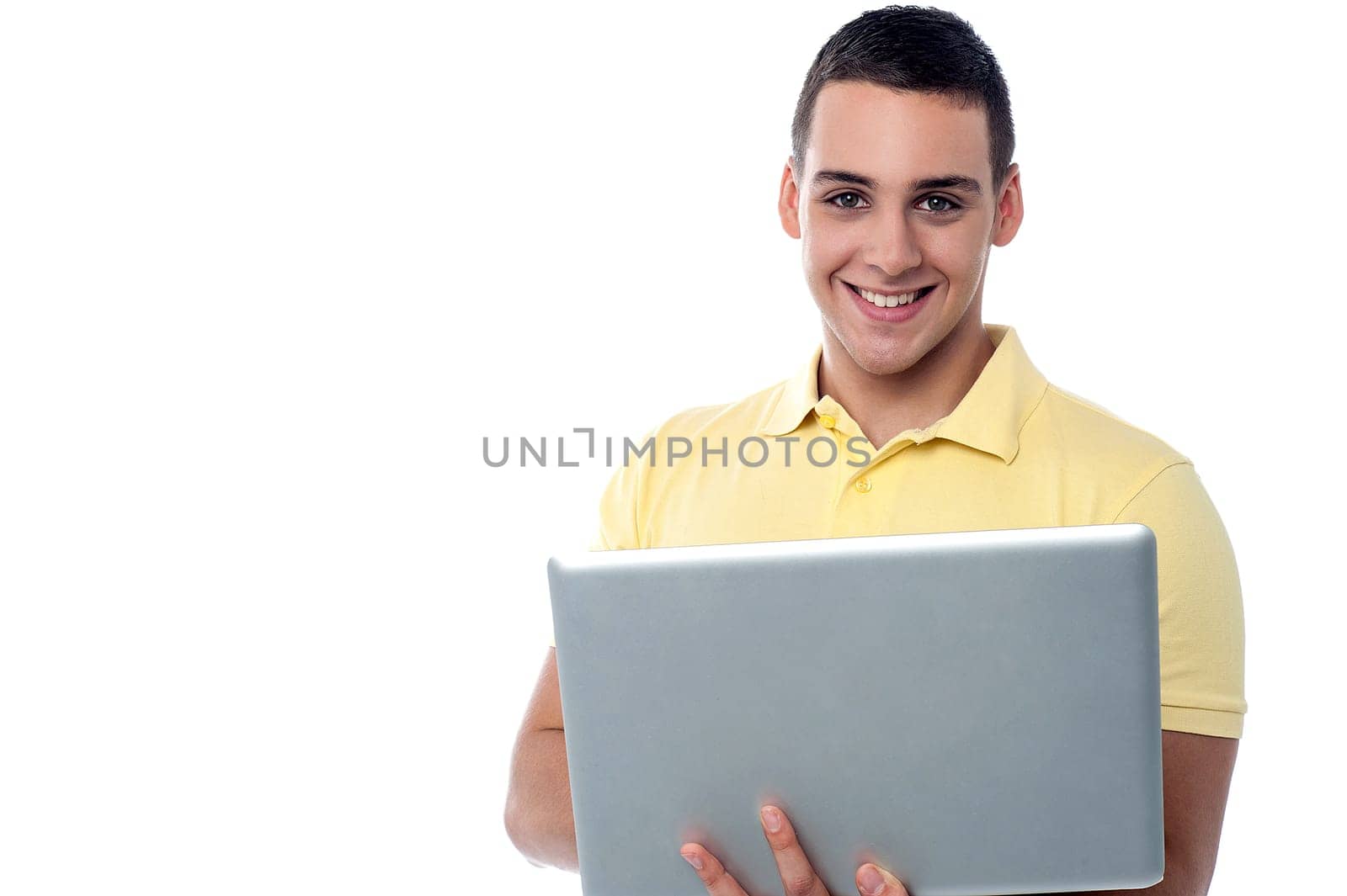 Teenager guy holding laptop