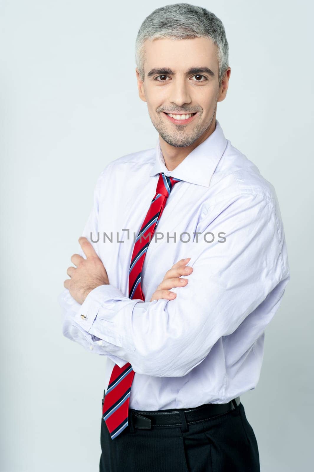 Young businessman posing in style