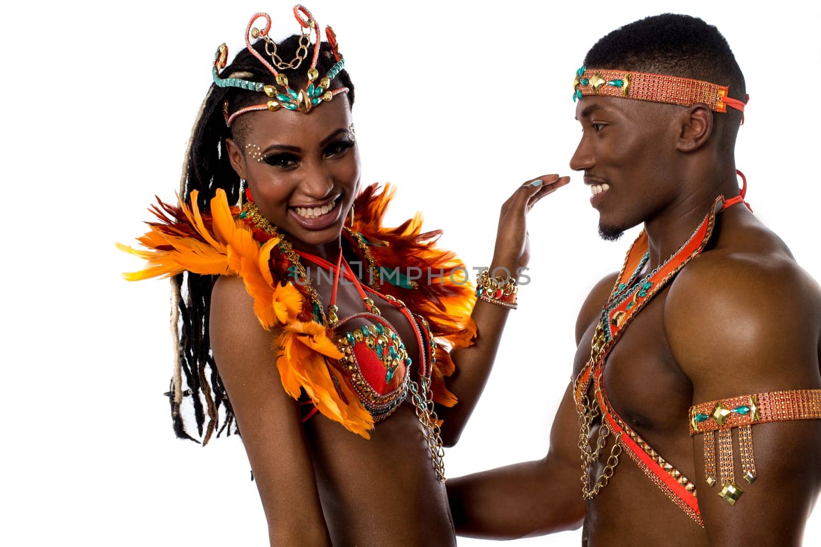 Samba dancers posing against white background