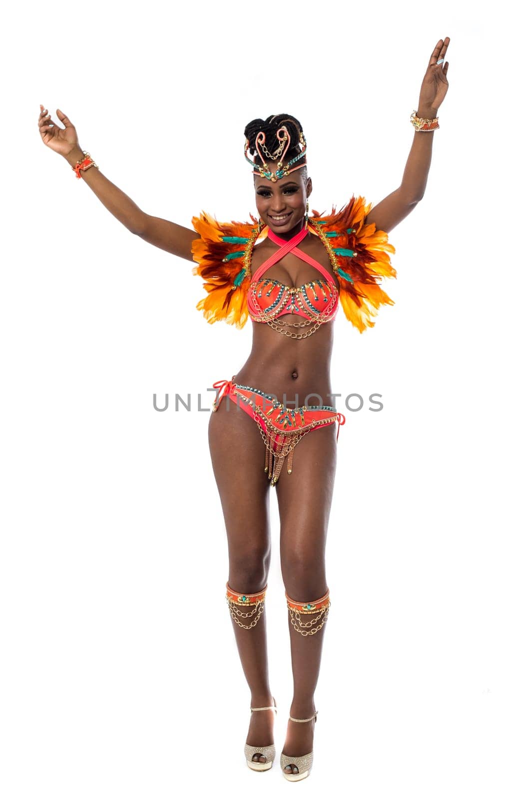 Samba dancer posing with hands in the air