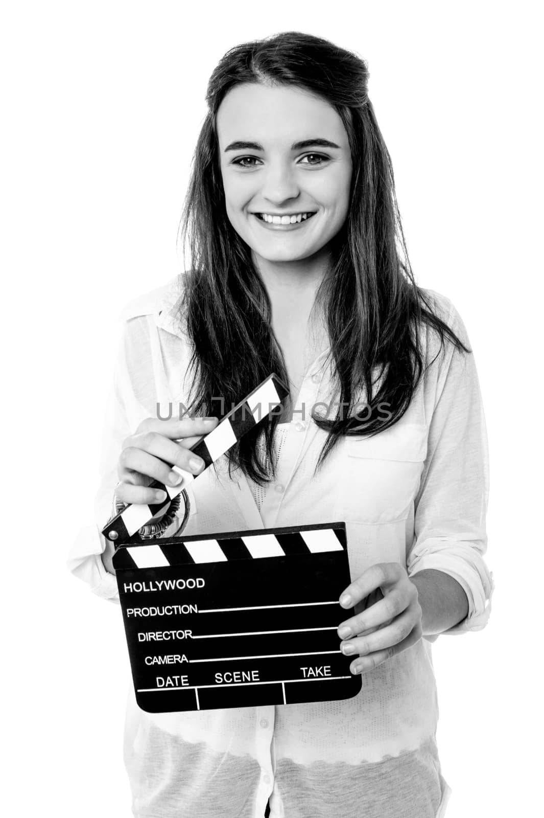 Pretty girl posing with clapperboard