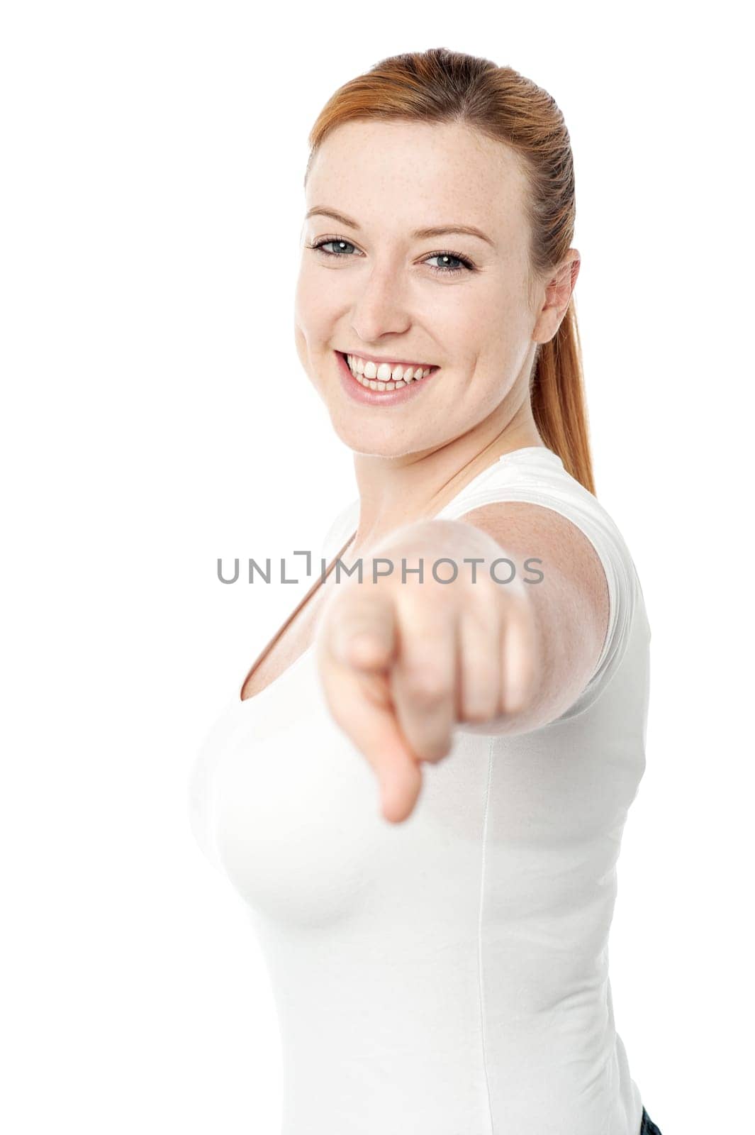 Happy young woman pointing you out