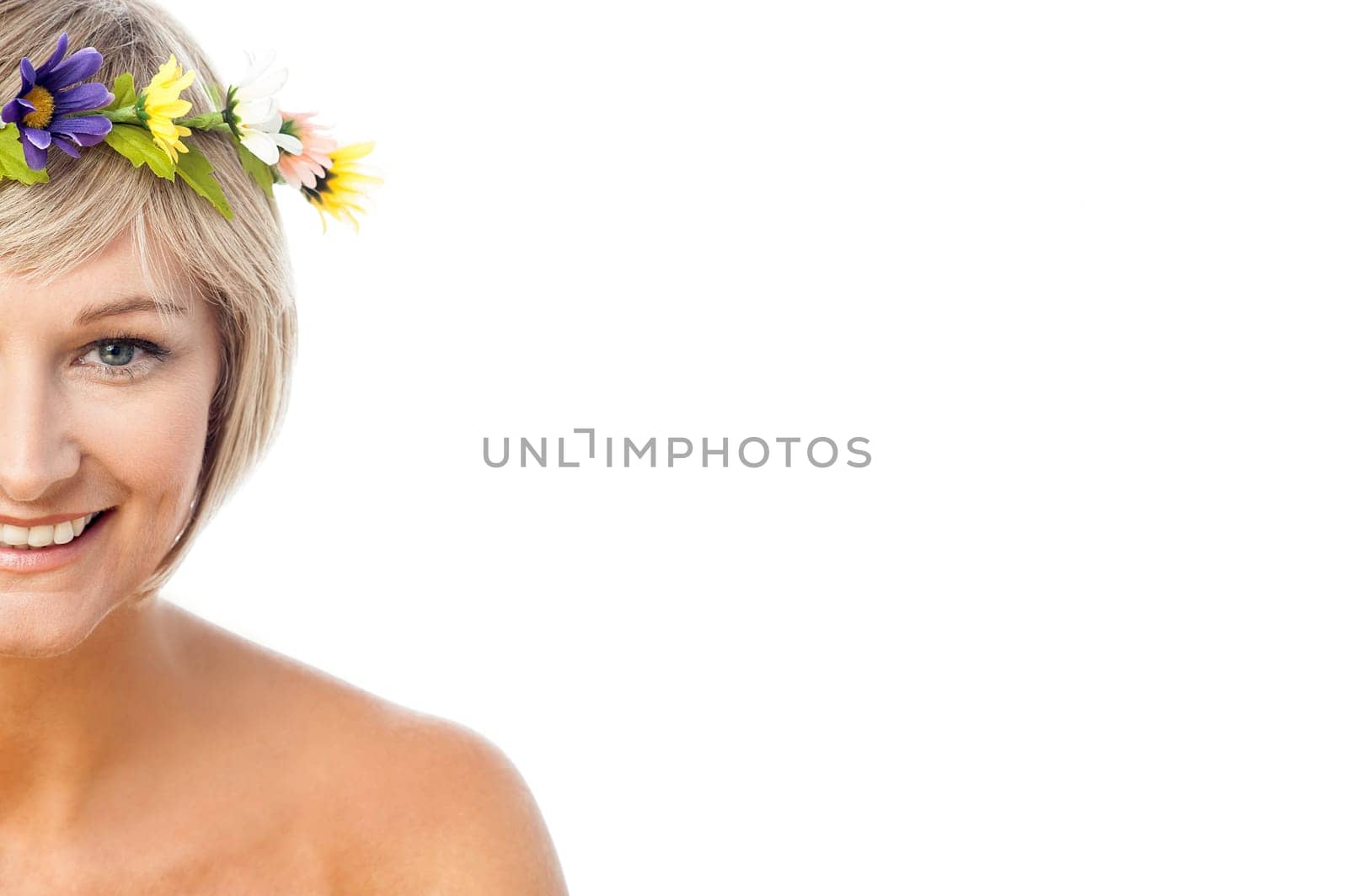 Cheerful woman wearing head flower crown