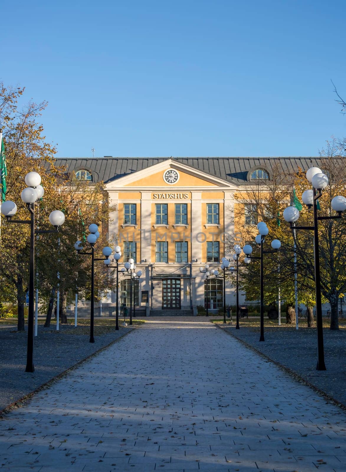 City Hall in Umeå, Sweden with a clear blue sky behind it.