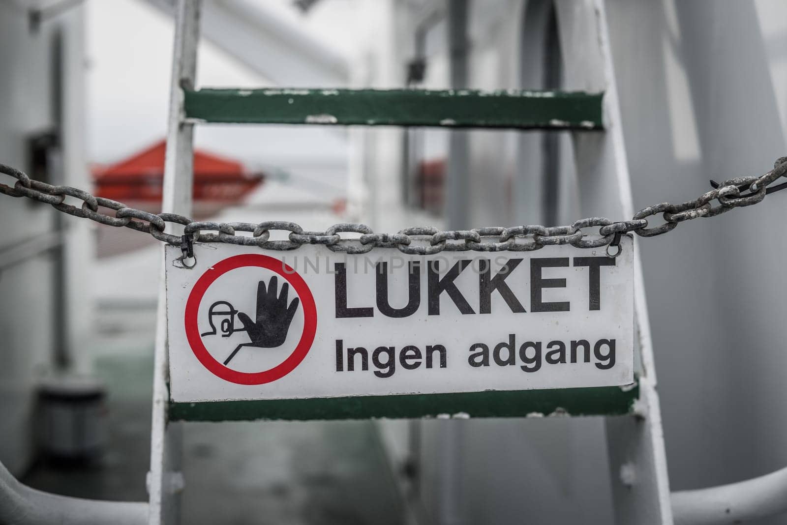 No access sign on a metal chain by a ladder