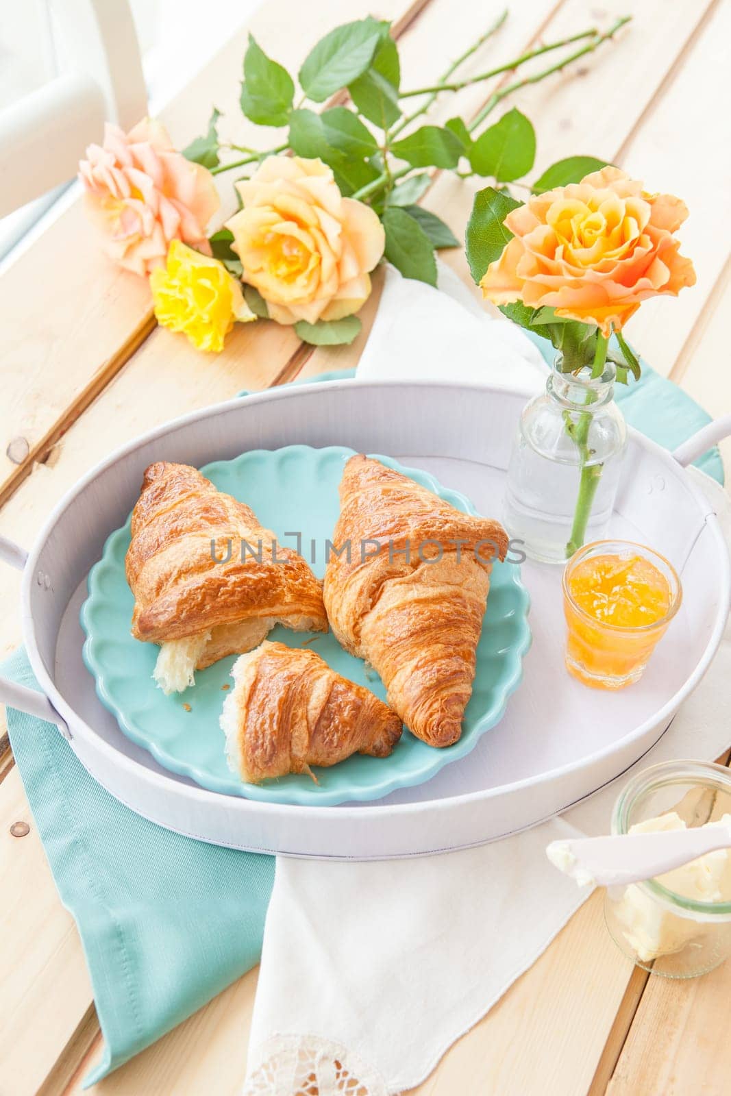 Fresh croissants with jams for breakfast