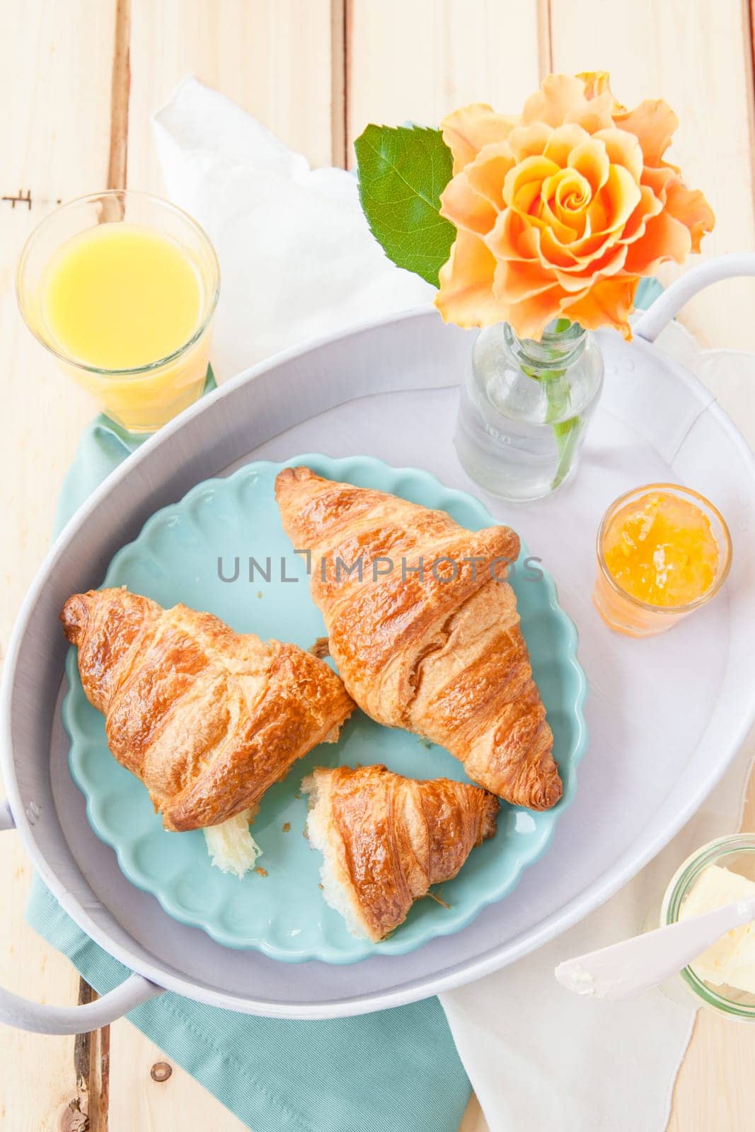 Fresh croissants with jams for breakfast