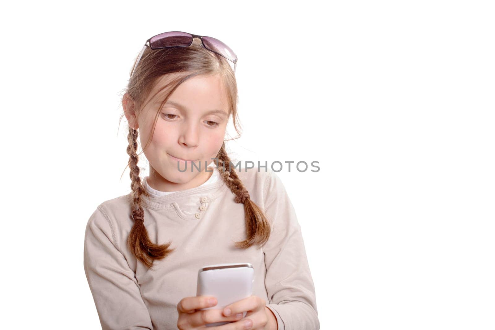 a young girl  with a mobile phone